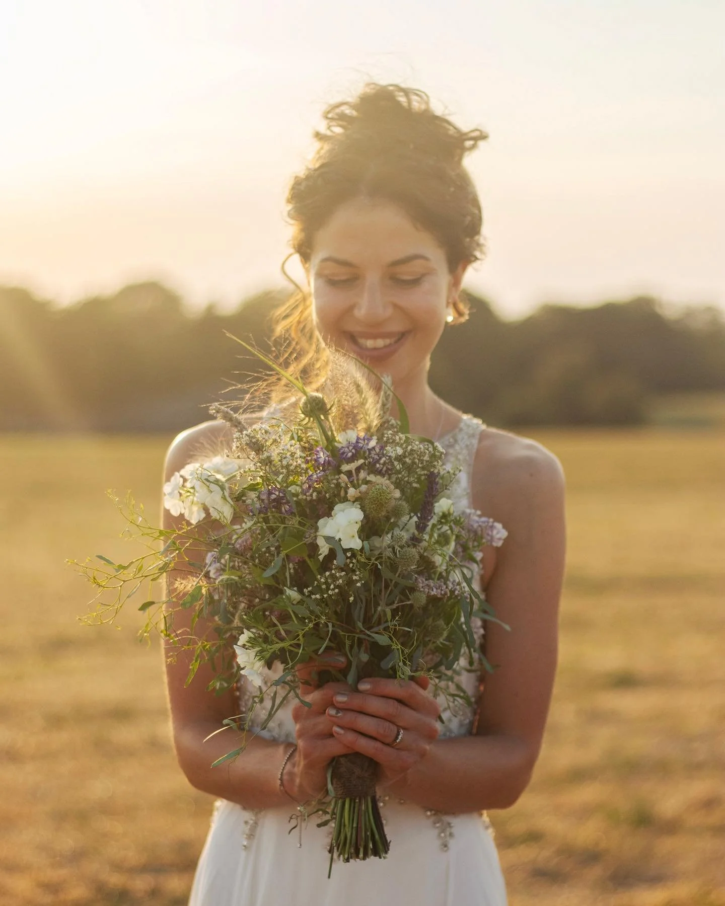 The most beautiful summer bride, and bouquet grown and picked by her mother in law 💫