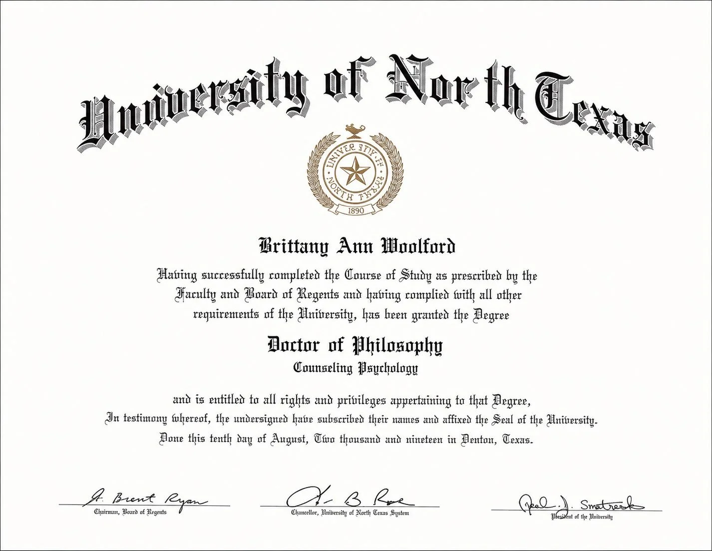 Doctorate degree certificate from the University of North Texas awarded to Brittany Ann Woolford in 2019, for earning a Doctor of Philosophy in Counseling Psychology, with signatures from university officials.