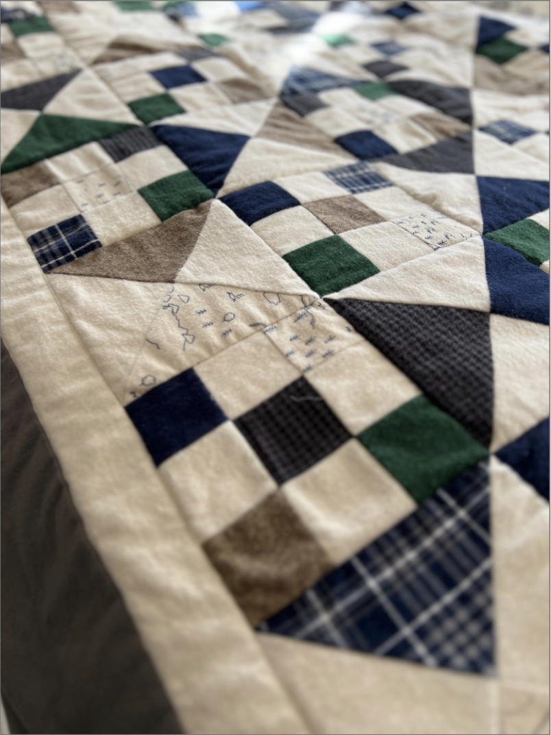 Since flannel has a natural fuzziness to its nap, 'stitch-in-the-ditch' is a perfect approach to hold everything in place and it won't interfere with the snuggle factor. 