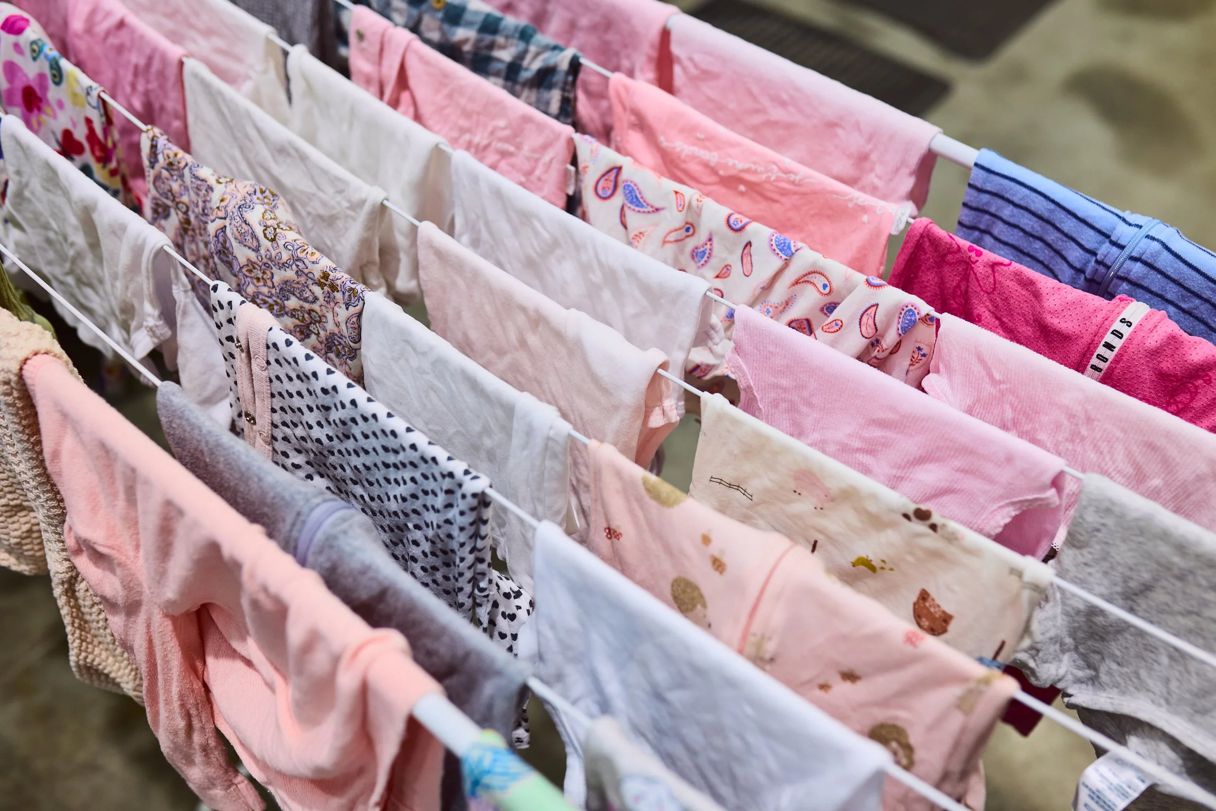 baby clothing on airer