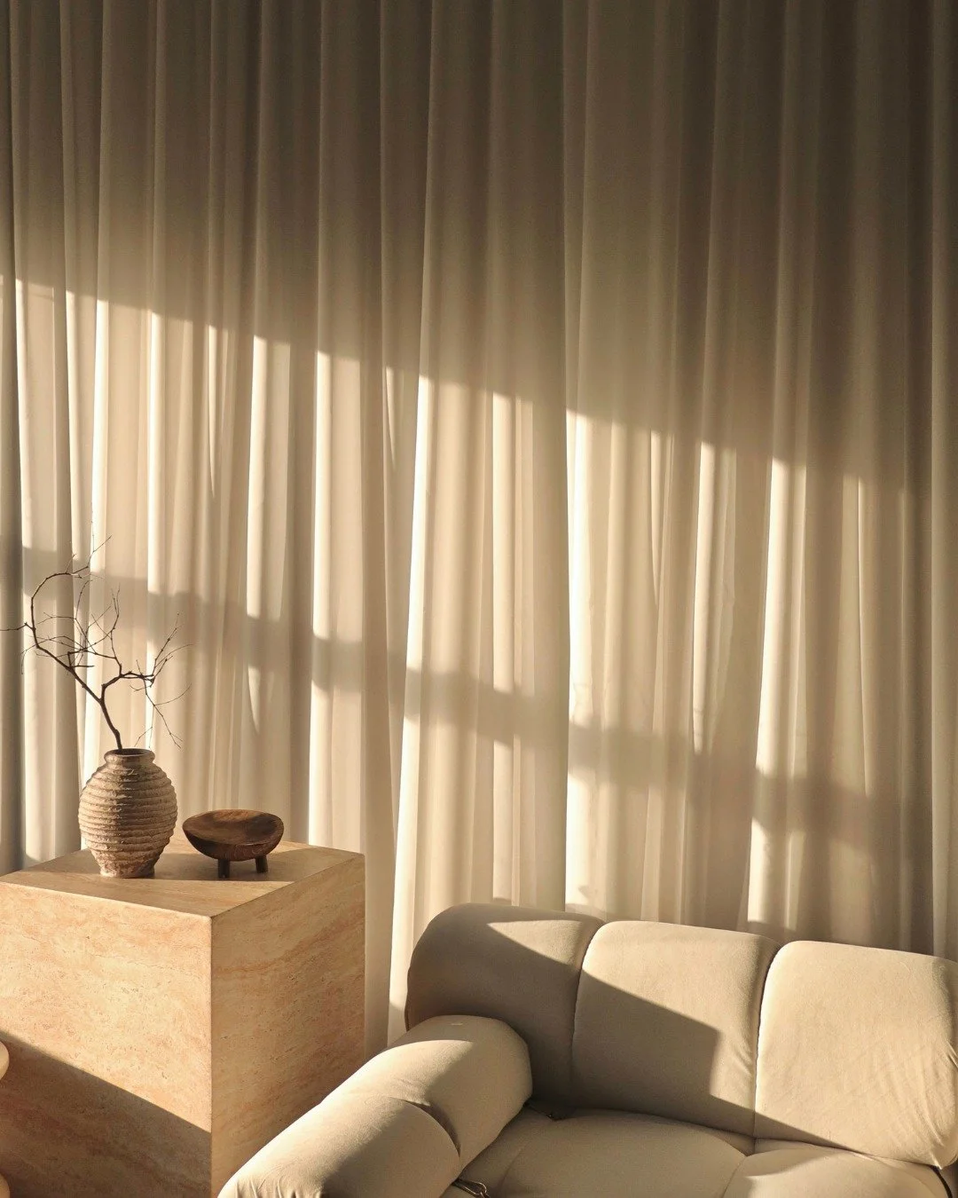 There&rsquo;s a conversation between the natural and the made &mdash; the sun drapes itself across textures, finding harmony in what was crafted by hand.