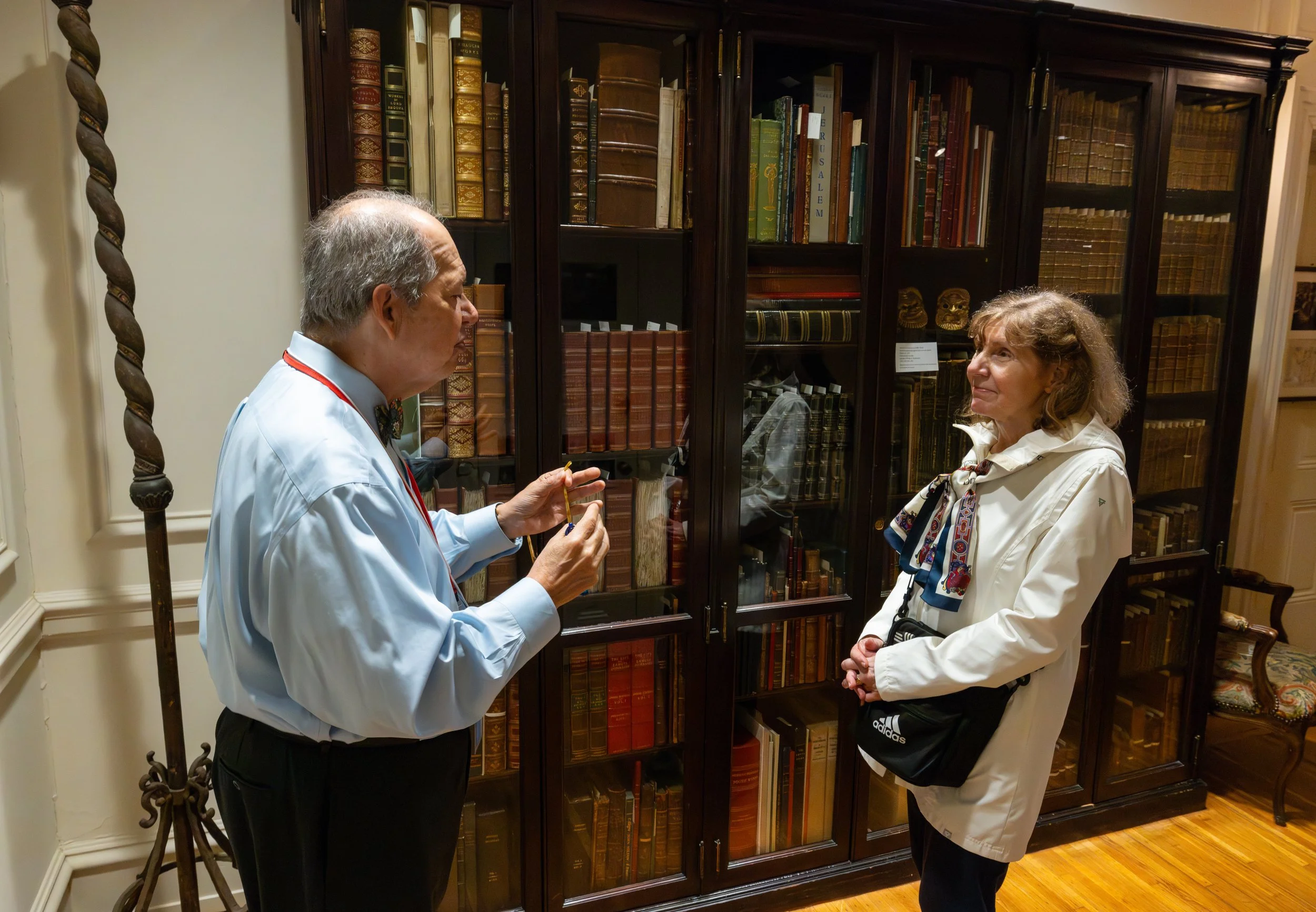 Joseph R. Gonzales discusses the collections with a visitor during Bloomsday 2025. Photo courtesy of Mark Garvin. 
