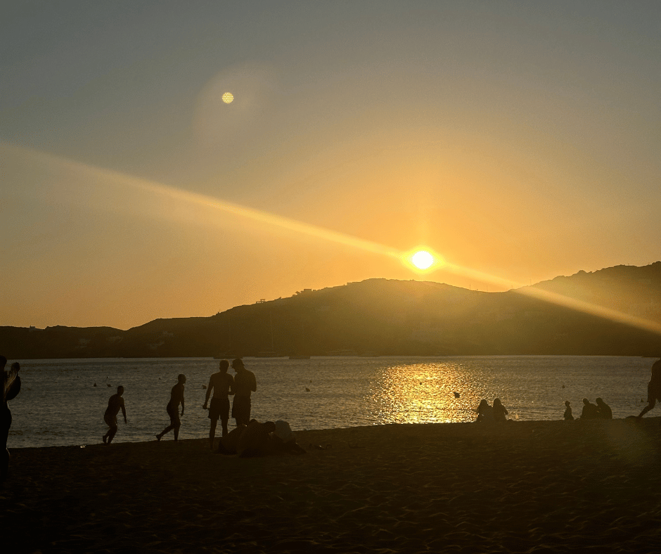 Sunset on a Greek beach during a solo female traveller’s trip