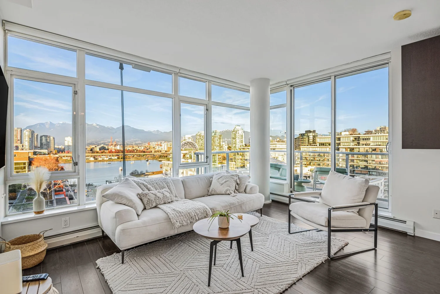 Bright condo living room with water views