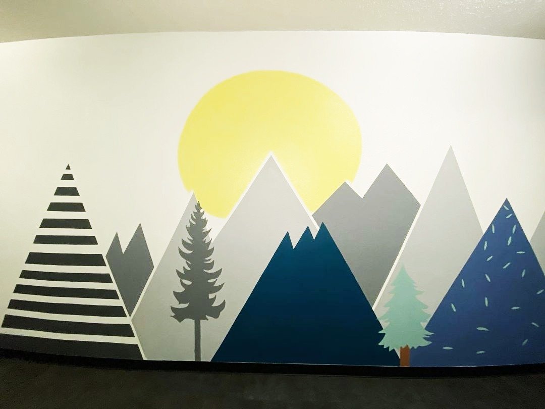 Sun Trees and Mountains Hand Painted in Calvary Chapel Church in Downey.jpeg