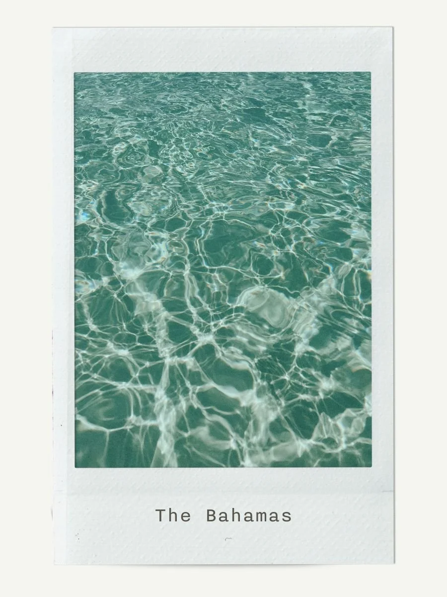 Photograph of clear turquoise water with reflections, labeled 'The Bahamas' at the bottom.