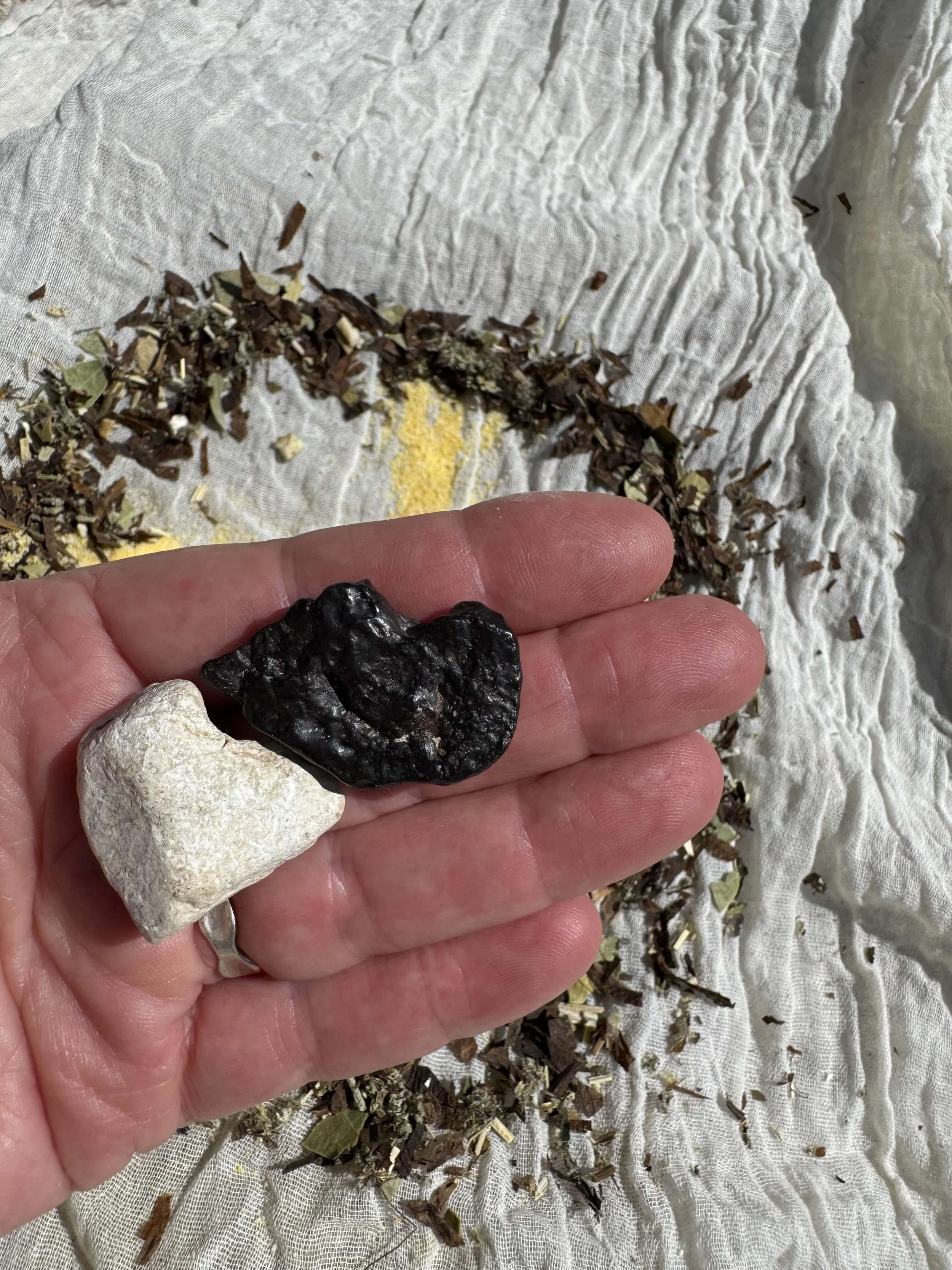 7. Stones from two different special places for the Centre. Here they also seem to represent the harmonisation of polarities like a Yin-Yang symbol.

