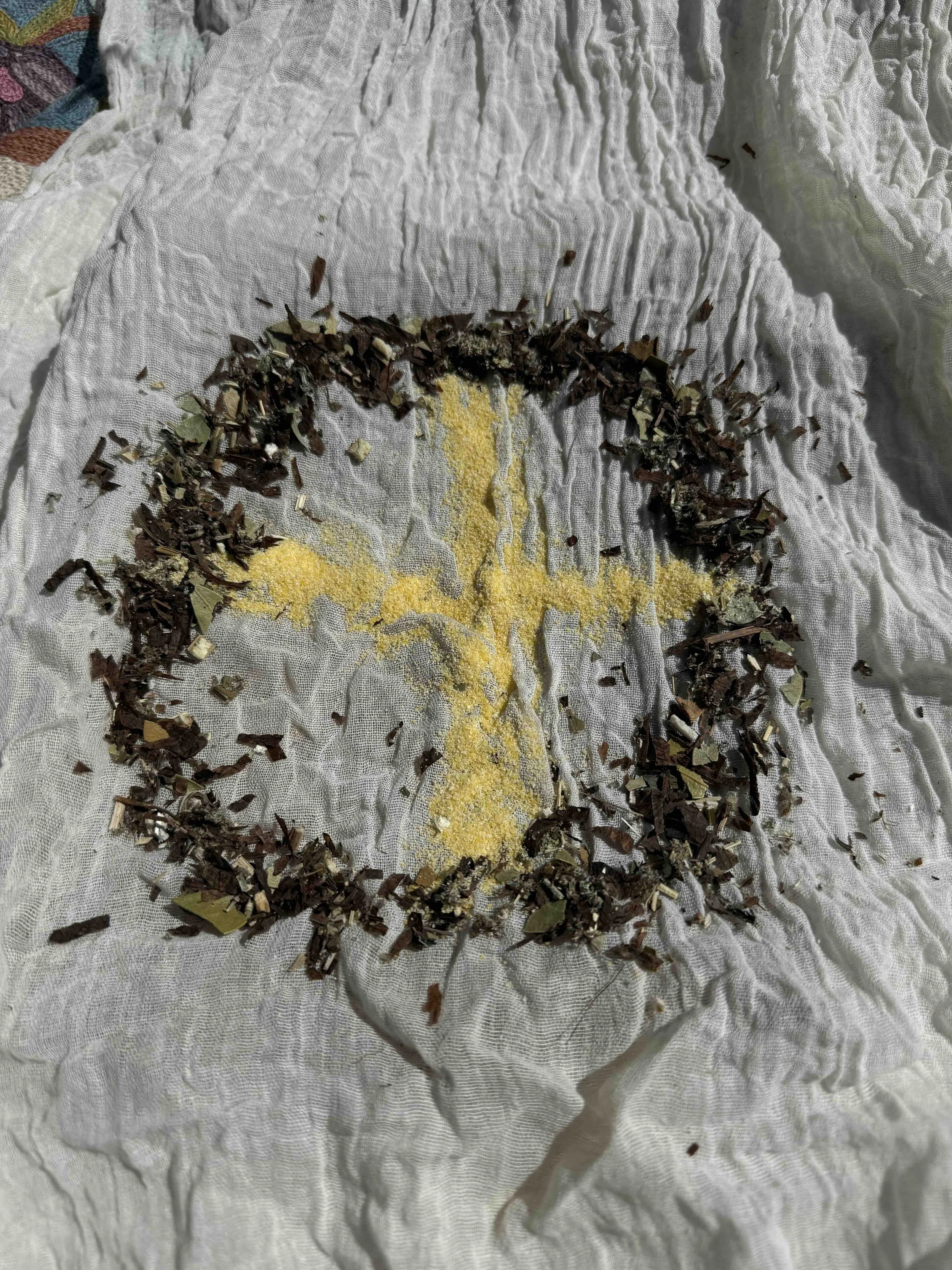 5. Creating the Sacred Circle with Tobacco and Herbs and Quadrants with Corn meal. 
Tobacco and Cornmeal are traditional, whereas the Herbs are a mix specific to the energies and medicine that I am aligning with.