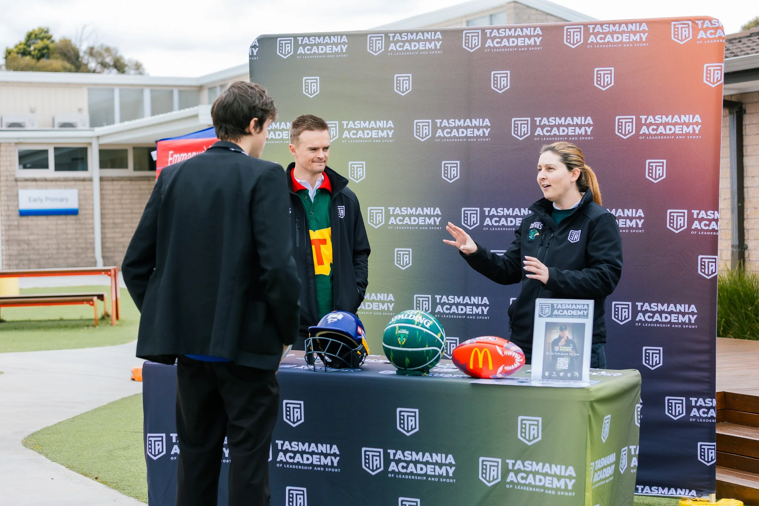 Emmanuel Christian School student discussing career opportunities with a representative from the Tasmania Academy of Leadership and Sport