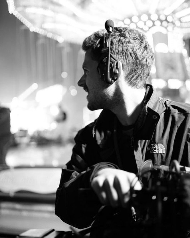 📽️In this shot, we captured @lukaslerche during @breakwaterstudios project Out of Office. Over seven days, we immersed ourselves in Bavaria and its people to create this documentary pilot. This photo was taken in front of the iconic Oktoberfest caro