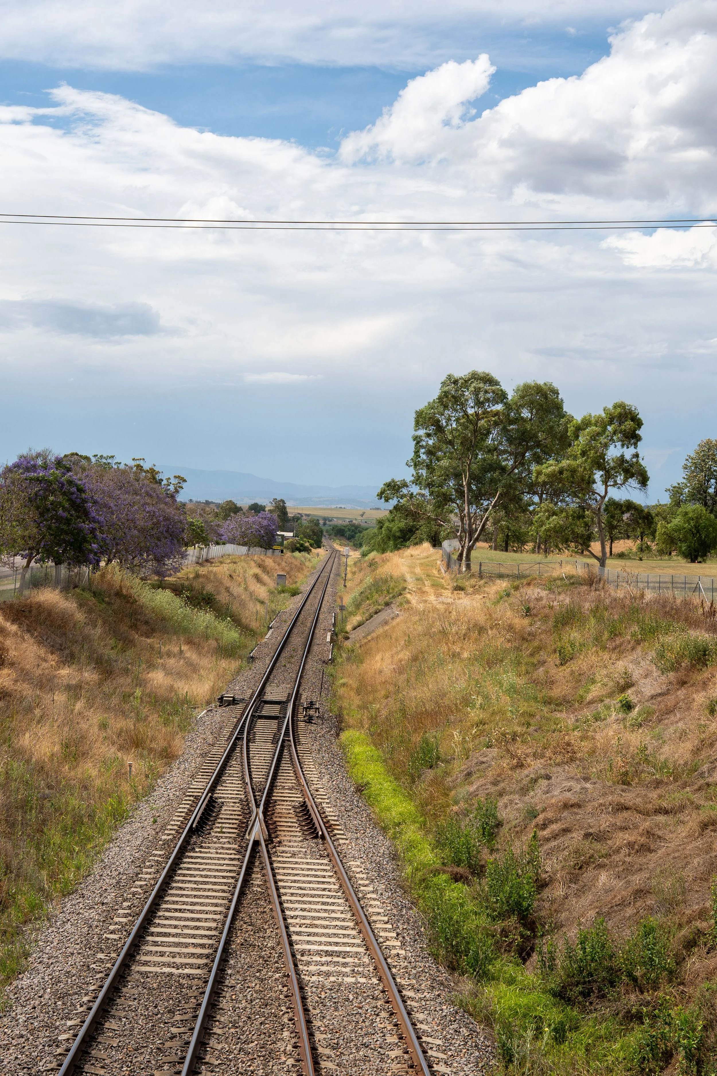 Train tracks at Aberdeen NSW Morii Media