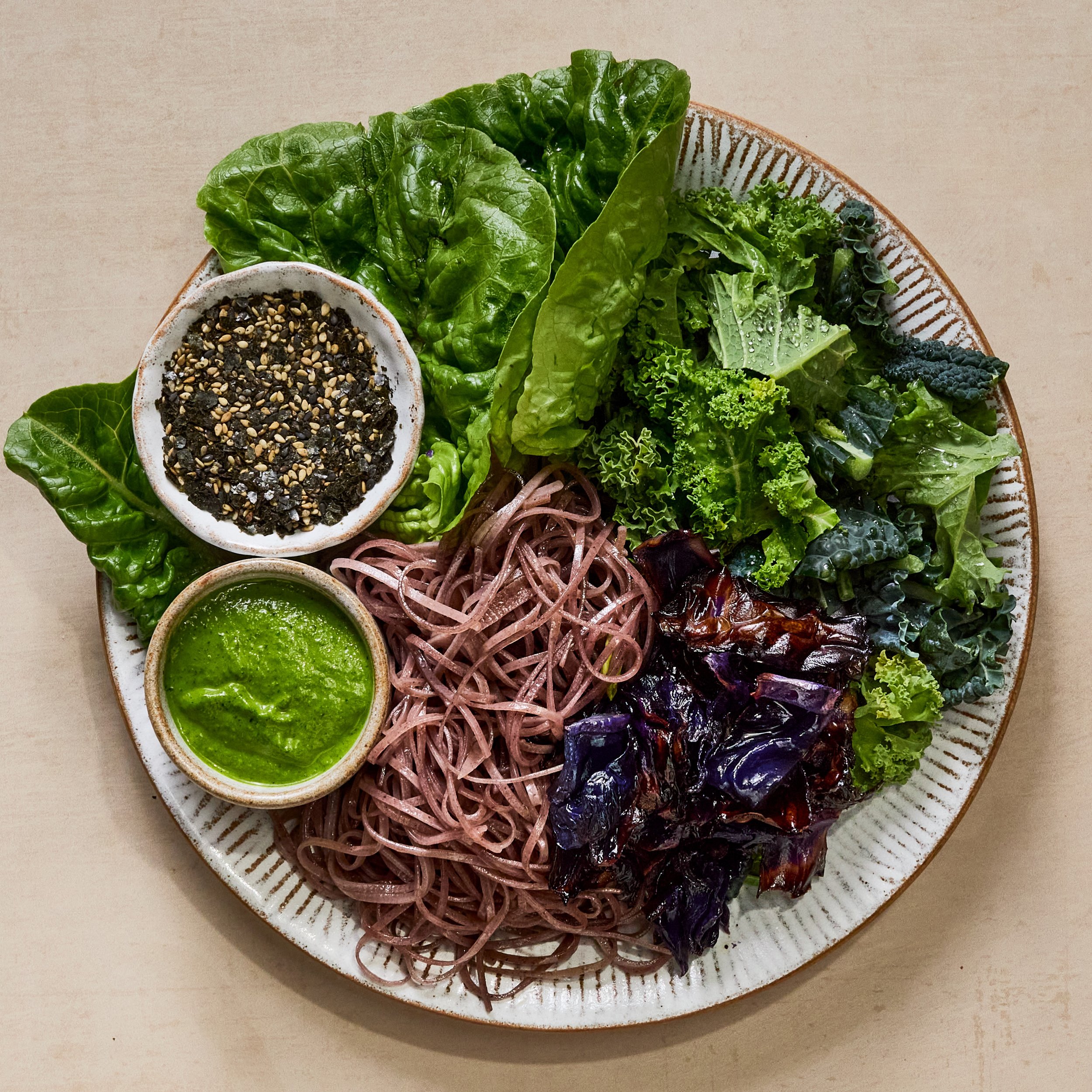 GREEN GODDESS @palmgreens 

Nutrient powerhouse, and serious umami deliciousness. 

Black rice noodles, mirin roast red cabbage, kale, baby green, mixed through generous in house green goddess dressing, finished with furikake. Perfect lunch. 

Availa