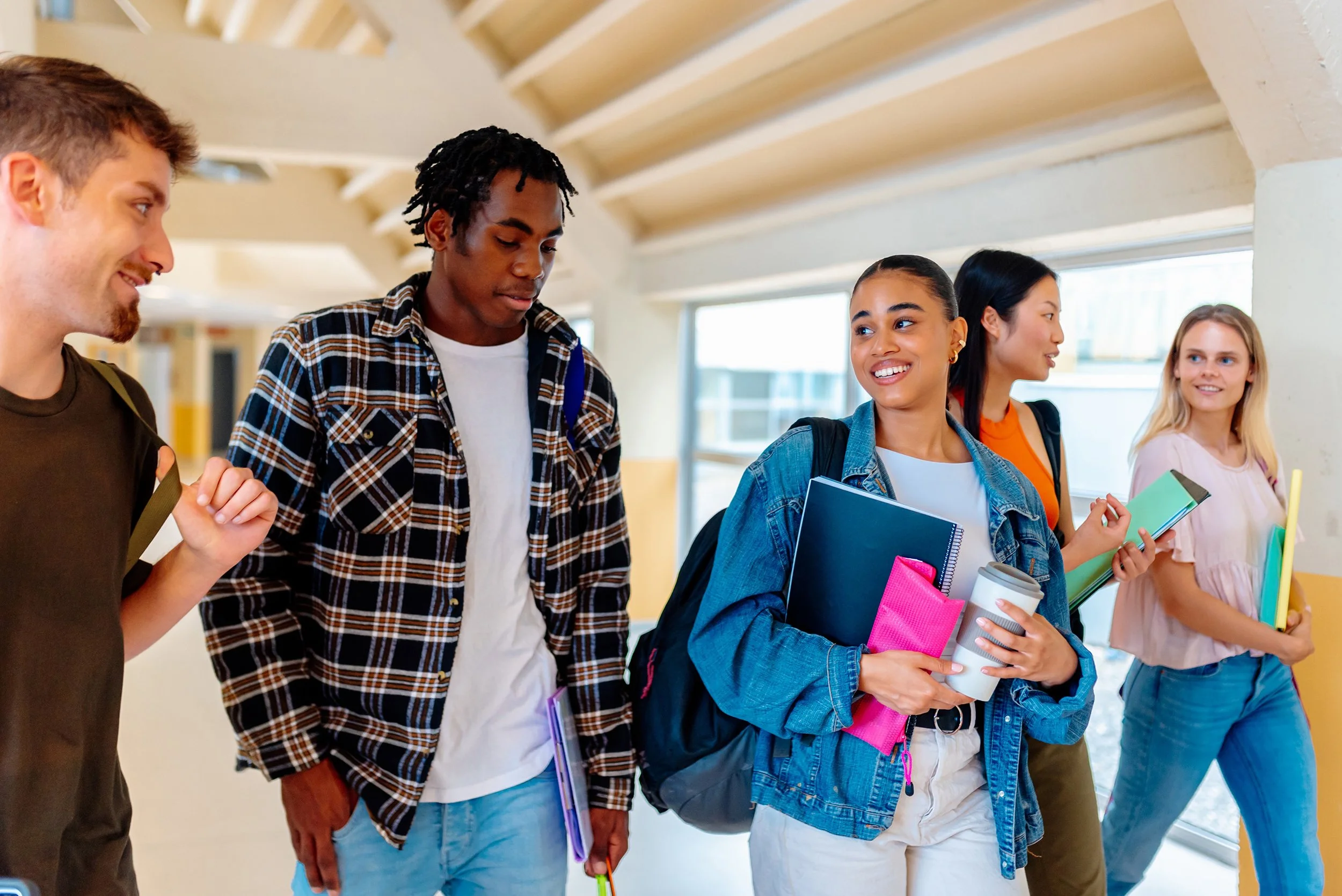 Young students walking and talking