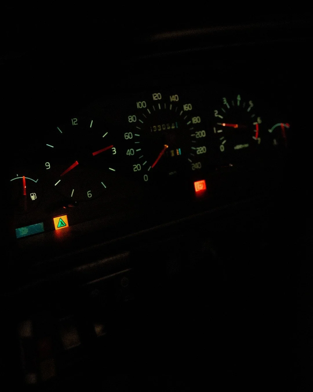 "The dashboard light lit up their faces..."