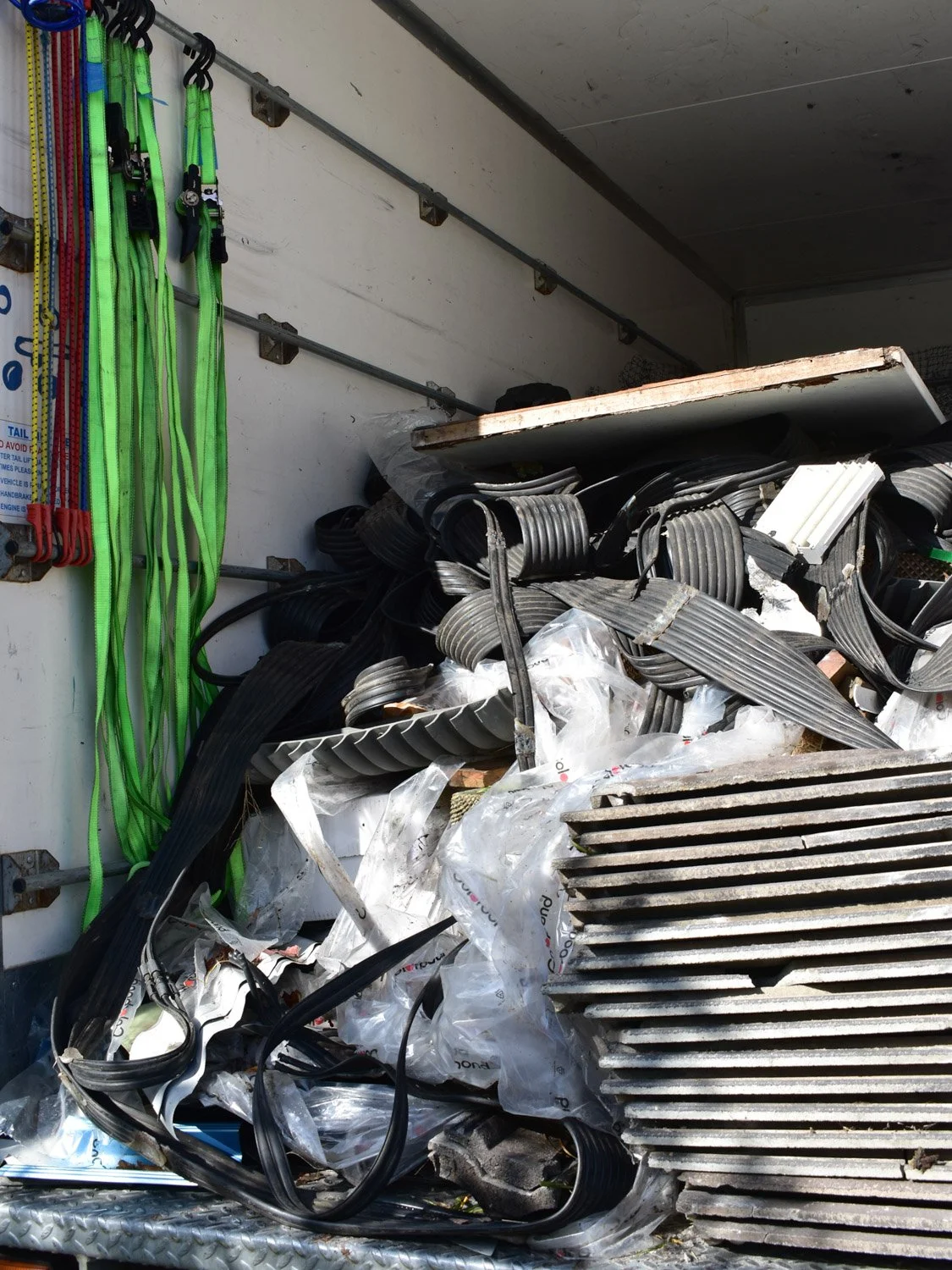 construction waste loaded inside junk removal truck Melbourne