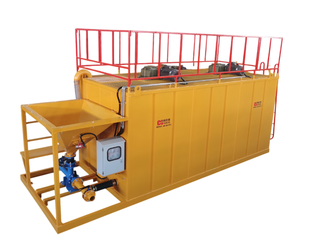 Large yellow industrial water treatment tank with red railing on top, connected to pipes and control panel at the front, used for water filtration or treatment process.