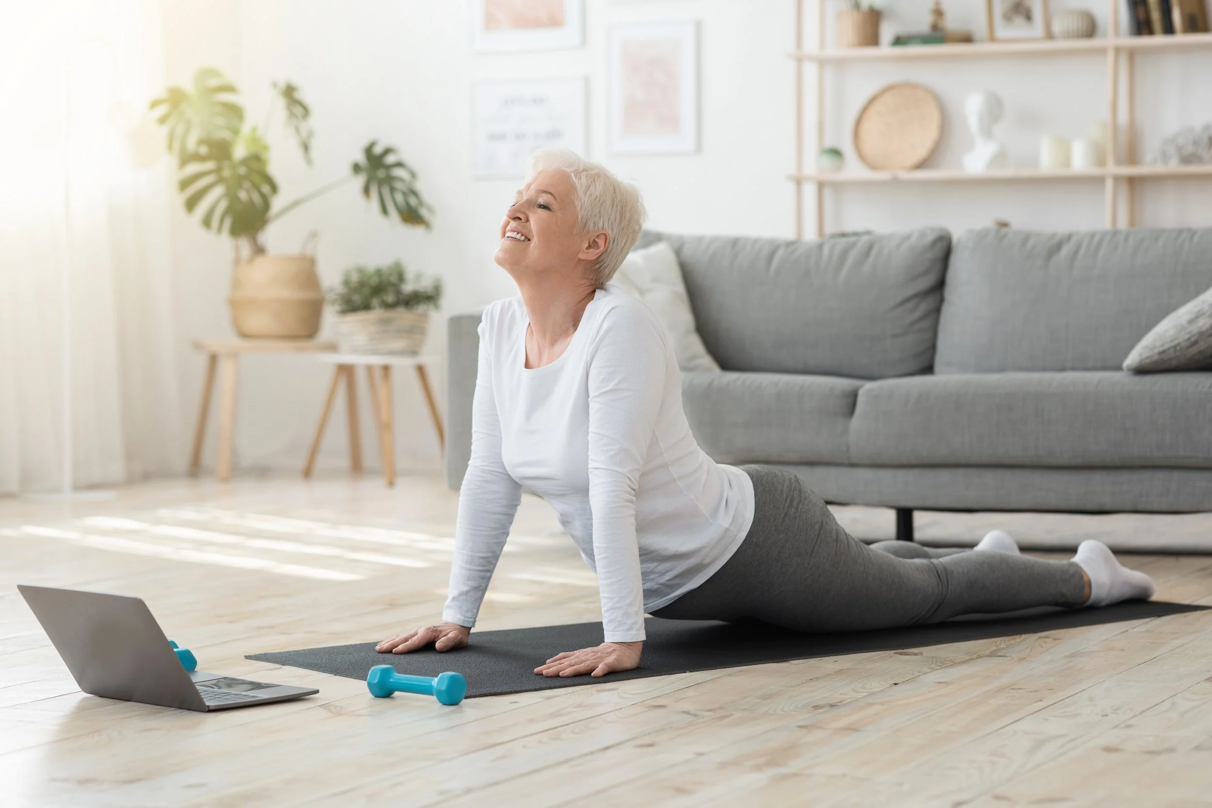 Woman doing weighted pilates