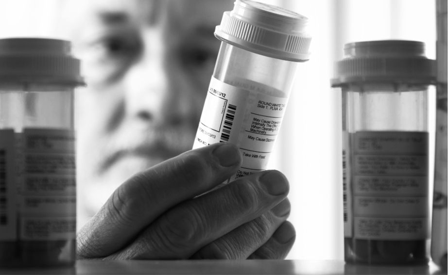 doctor looking at medicine