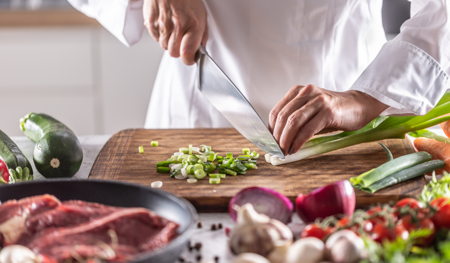 Chef chopping vegetables