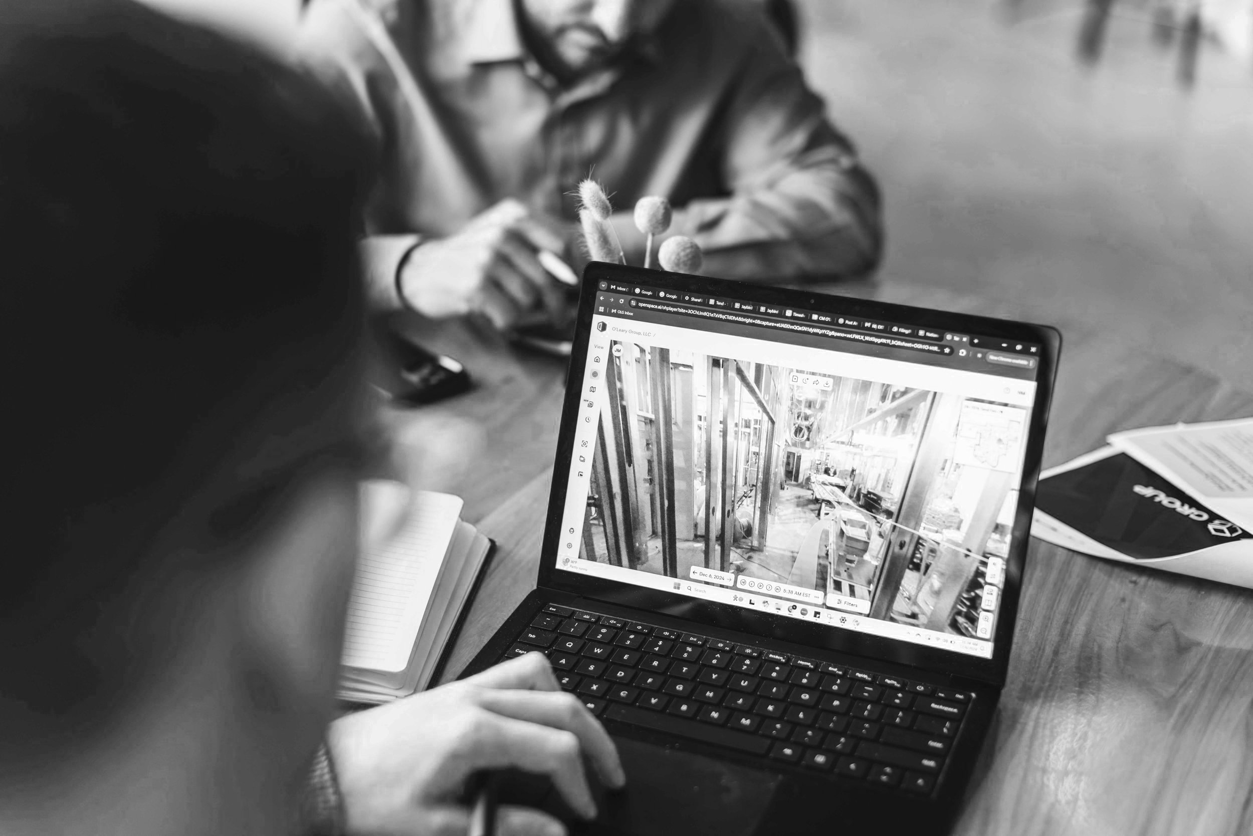 O’Leary Group employee reviewing a digital construction site walkthrough.
