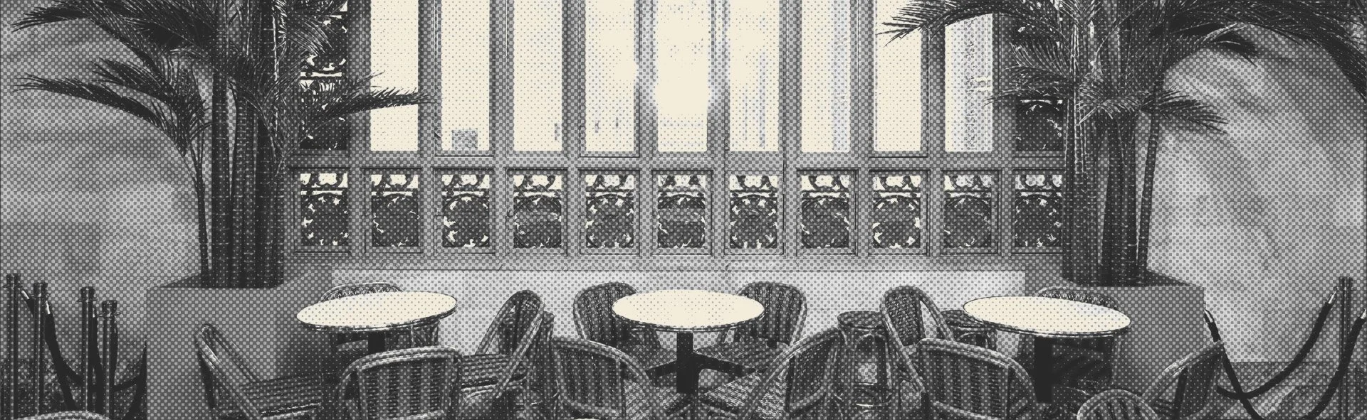Seating at The Campbell cocktail lounge at Grand Central Terminal with brand texture overlay.