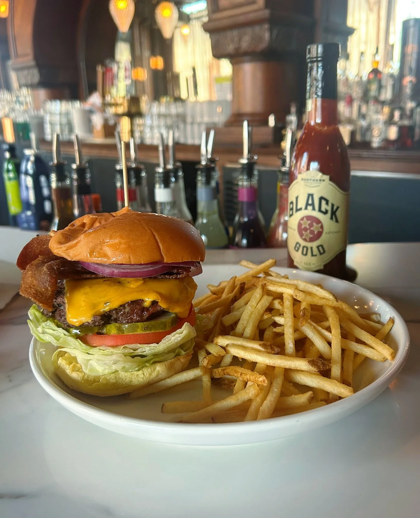 Name a better duo than a hickory-smoked burger and fries with a side of Black Gold Texas Ketchup, we&rsquo;ll wait. 🍔⁠
⁠
#hickorysmoked #texasketchup #franklintn⁠
⁠