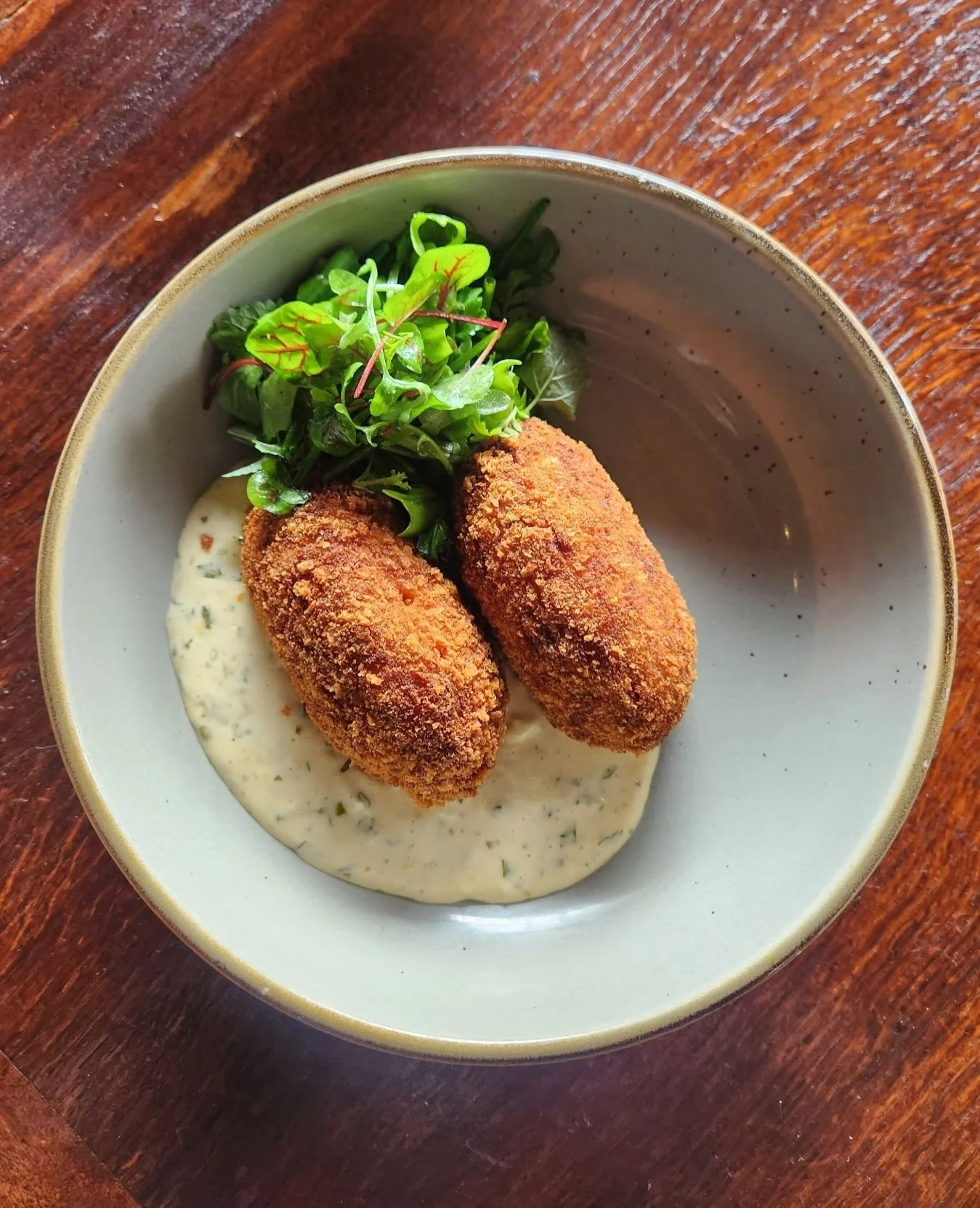 Stick with your favorite dishes, or try something new! Tonight we&rsquo;re offering two chef&rsquo;s specials: ⁠
⁠
Salmon croquettes made with Patagonian salmon, house made remoulade, and micro herb salad. 🐟️⁠
⁠
Fried Oysters made with a half dozen 