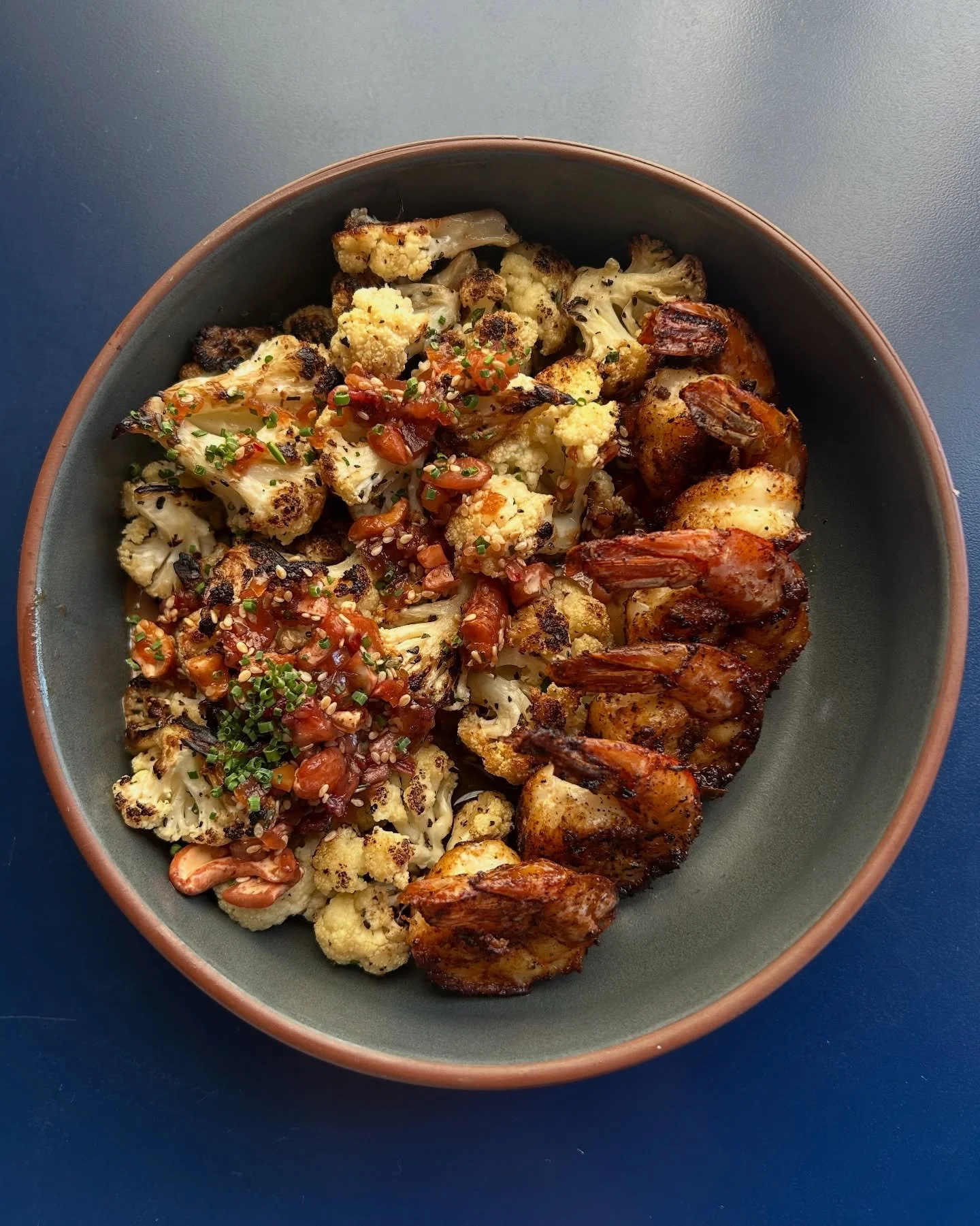 The roasted cauliflower appetizer is as photogenic as it is delicious. Made with strawberry sesame cashew agrodolce and black garlic aioli, this pairs perfectly with blackened shrimp. 

#franklinfoodie #thefactoryatfranklin #franklintn