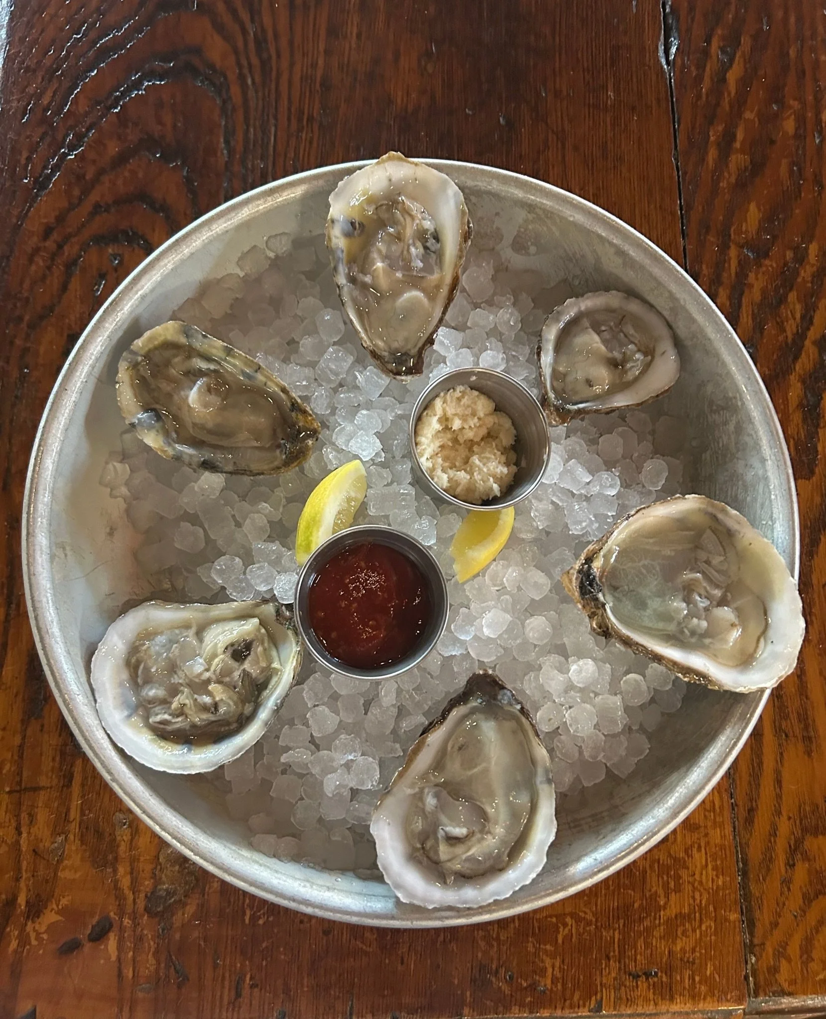 Have you heard about our $7 Happy Hour? 🦪🍷⁠
⁠
Grab a friend and stop by Tuesday - Sunday between 3 -6 PM because everything on our happy menu is $7! This includes light snacks, 2 for 1 draft beers, house wines, house spirits, and of course, a half 