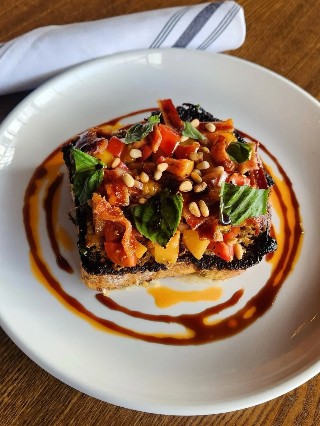 Back by popular demand on the specials list tonight, Chef Mike&rsquo;s Parmesan Pain Perdu! Book your table via the link in bio.

SAVORY BRIOCHE FRENCH TOAST WITH PARMESAN CRUST. GRILLED PEACH &amp; HEIRLOOM CHERRY TOMATO SALSA, POMEGRANATE BALSAMIC 