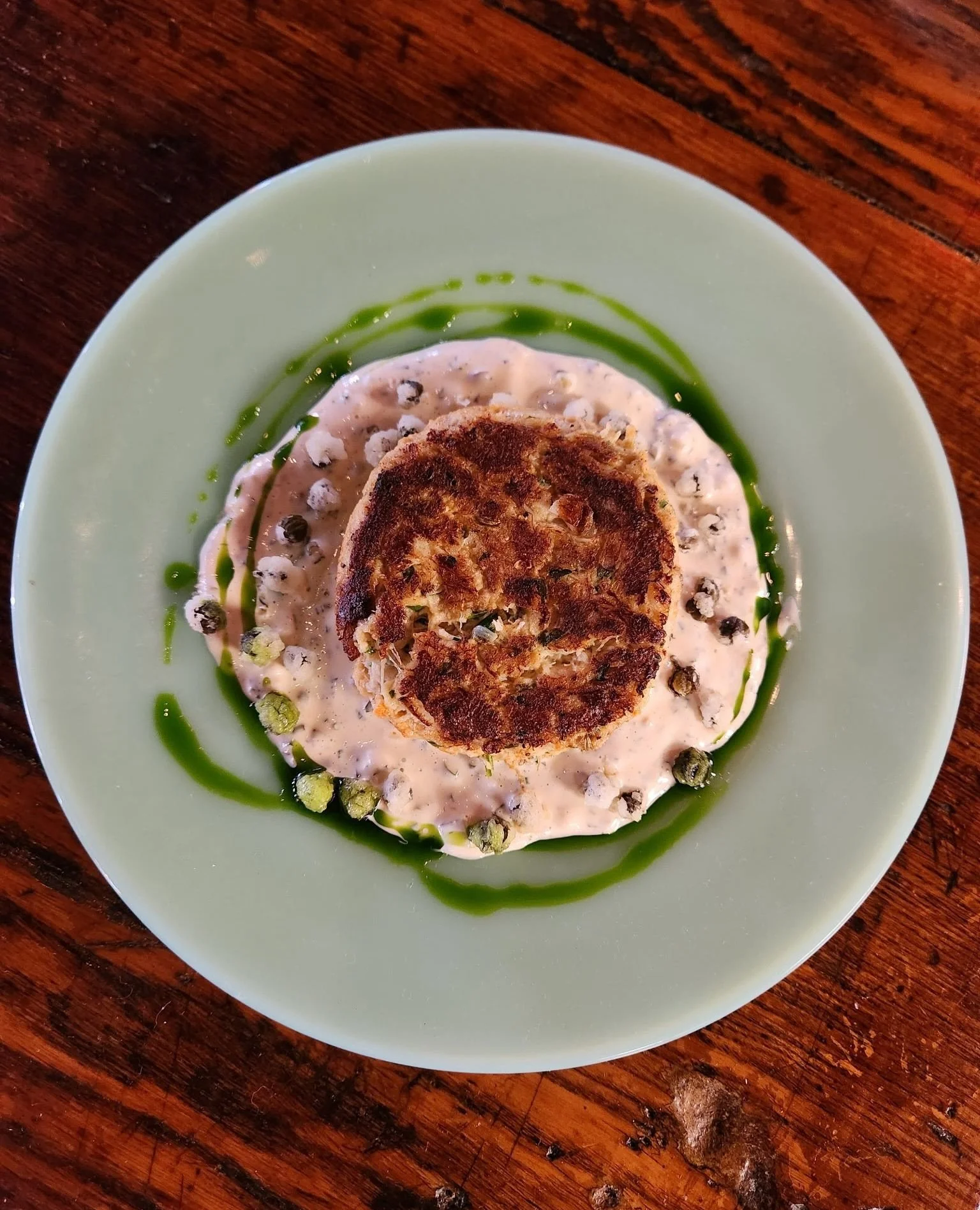 Order a crab cake for the table, or be shellfish and get one for yourself. 😉⁠
⁠
Our crab cake is made with spicy remoulade, fried capers. 🦀⁠
⁠
#factoryatfranklin #finediningfranklin #franklintn⁠