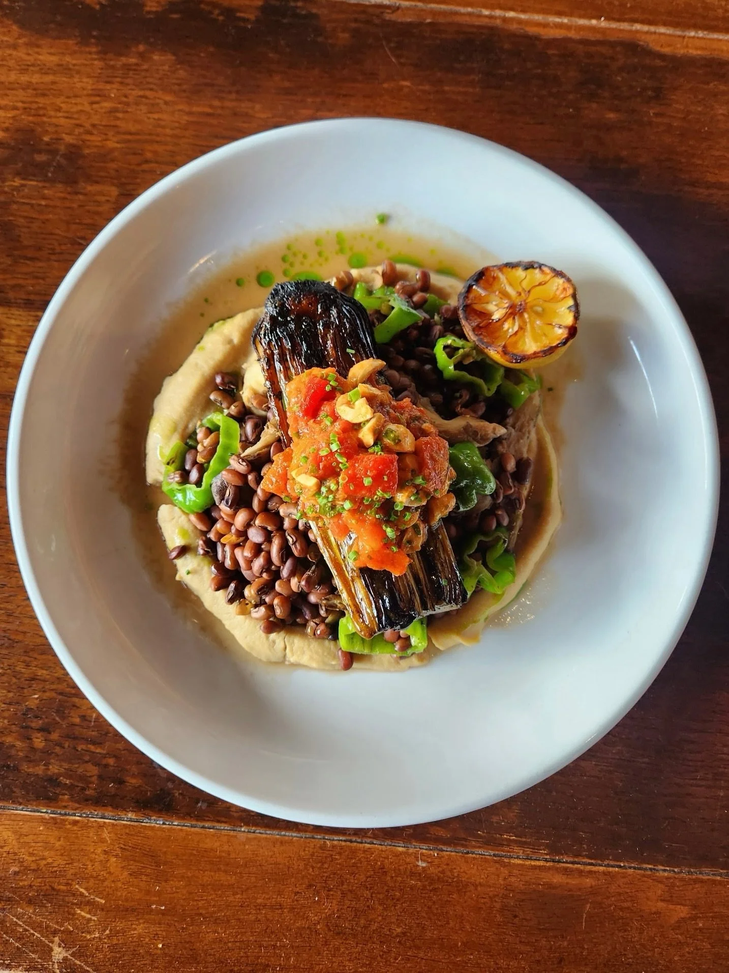 Chef Mike Detzel has created a gorgeous new Farmer&rsquo;s Plate! 

Made with Marsh Hen Mills heirloom sea island red peas with saut&eacute;ed local blue oyster mushrooms and shishito peppers, roasted parsnip pur&eacute;e, grilled &amp; lacquered lee