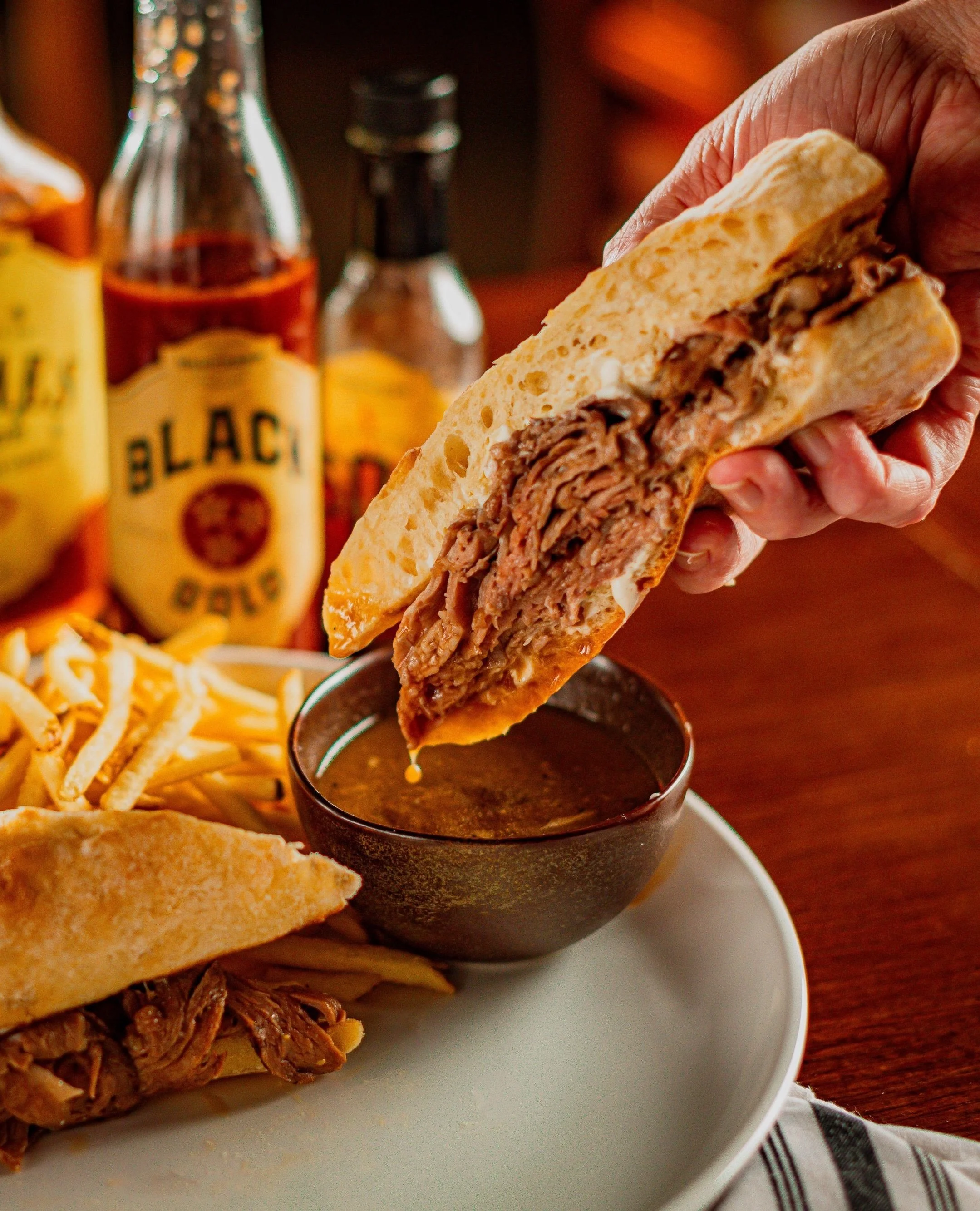 The Saffire Dip is lunch fit for a foodie king or queen!⁠
⁠
Made with house-smoked hickory wood fired prime rib and horseradish all on a toasted baguette with a side of au jus.⁠
⁠
📸: @drewmaynard⁠
⁠
#factoryatfranklin #franklintn #lunchfranklin⁠