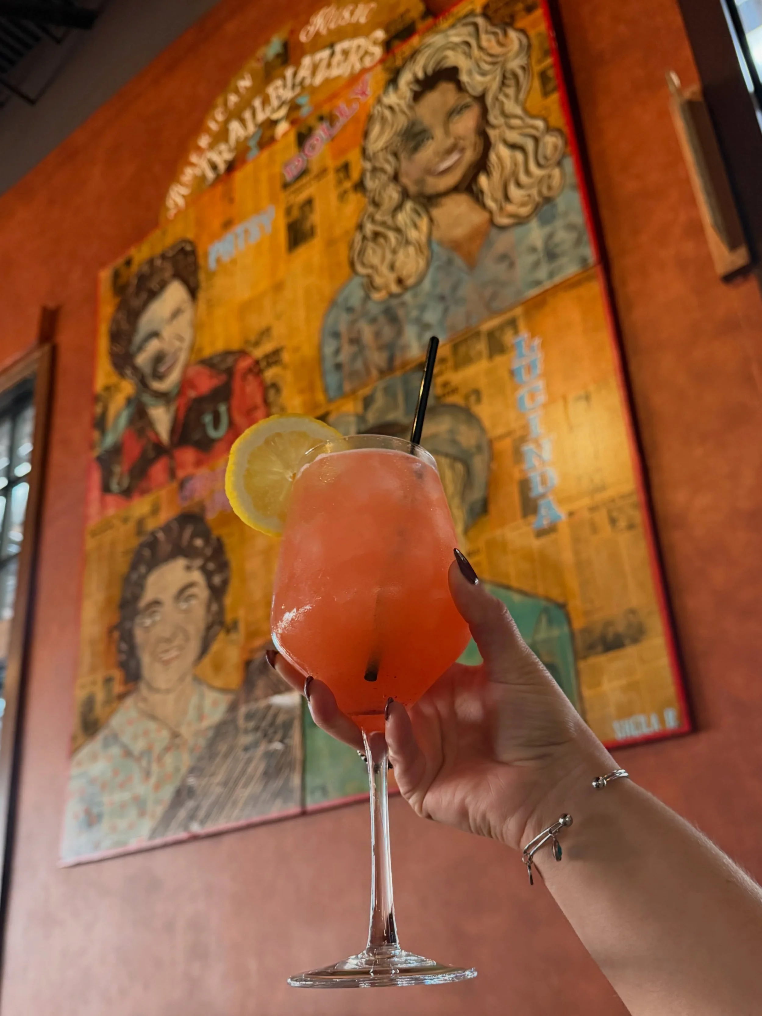 Happy Dolly Day! On 9/25 across Nashville, people are celebrating the legacy of kindness, generosity, and music of Dolly Parton.

Come enjoy the &ldquo;Cup of Ambition,&rdquo; available just on Dolly Day, made with gin, grapefruit, elderflower, lemon