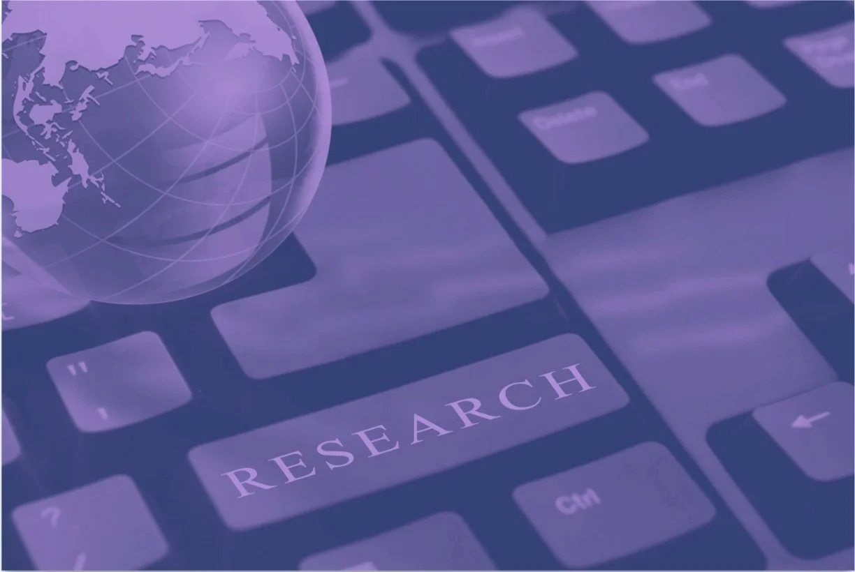 Keyboard with a globe graphic and the word 'Research' on one key.