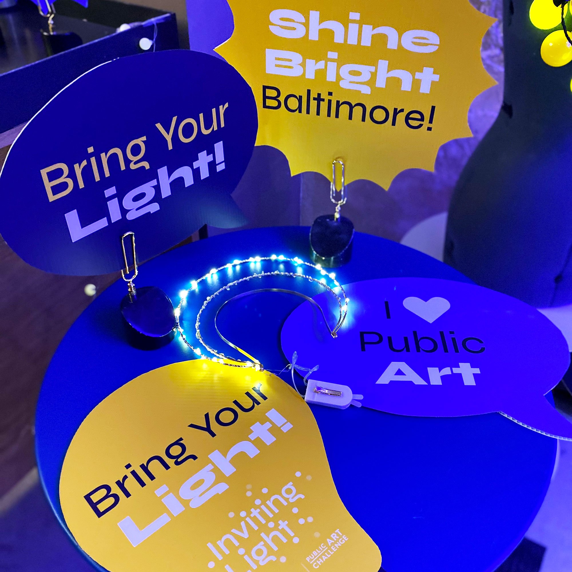 InvitingLight-Bloomberg-Baltimore-booth-signs-square.jpg
