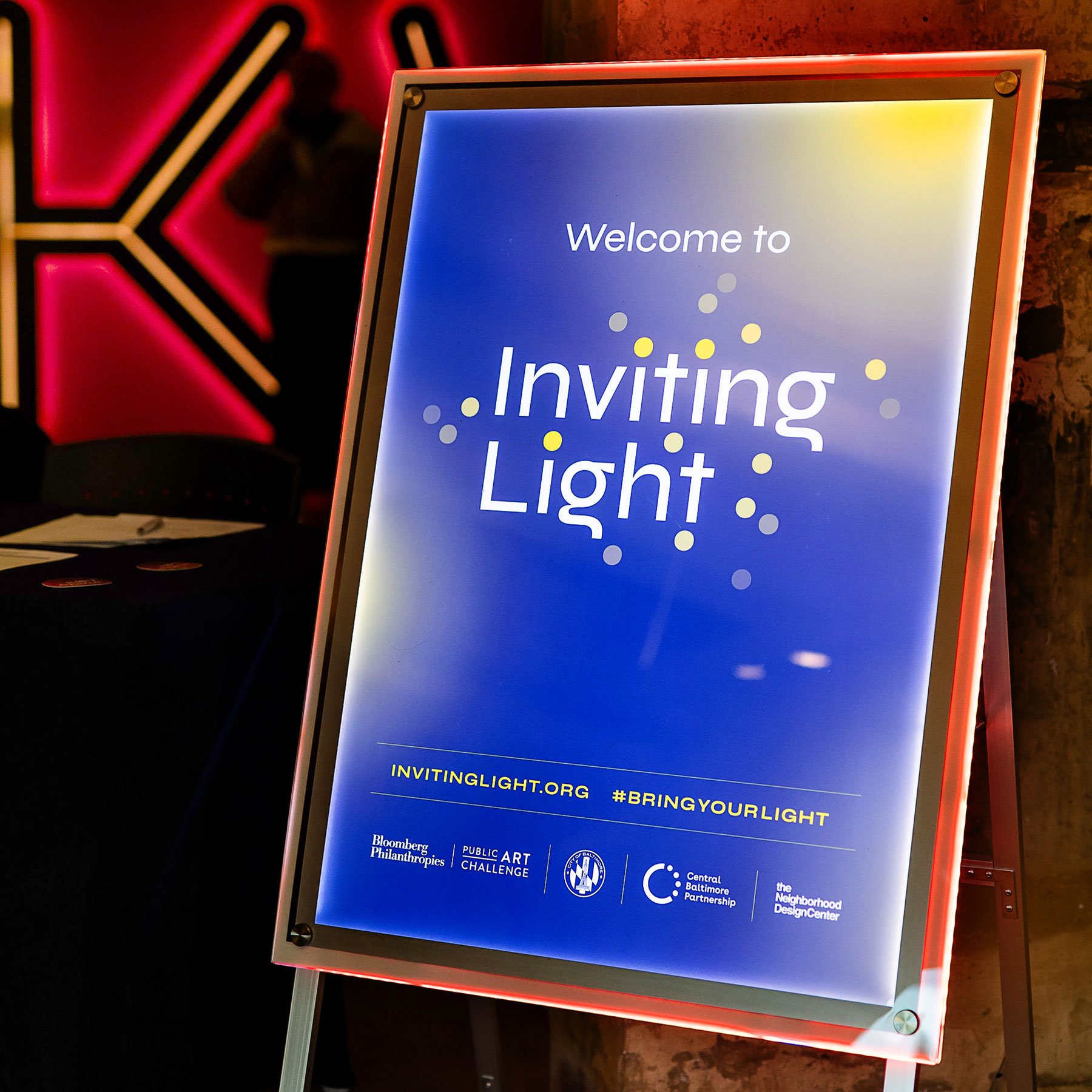 InvitingLight-Bloomberg-Baltimore-lit-sign-square.jpg
