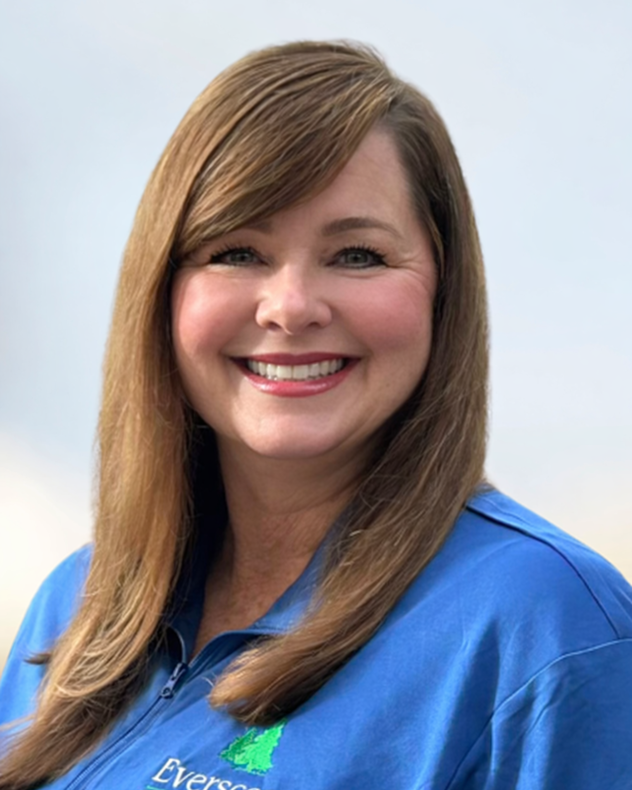 Michelle Austin, general manager of Everscapes Landscaping smiling in portrait