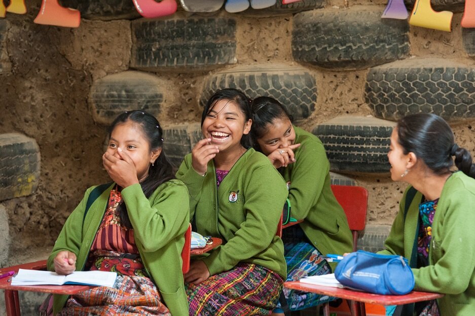 girls laughing in class.jpeg