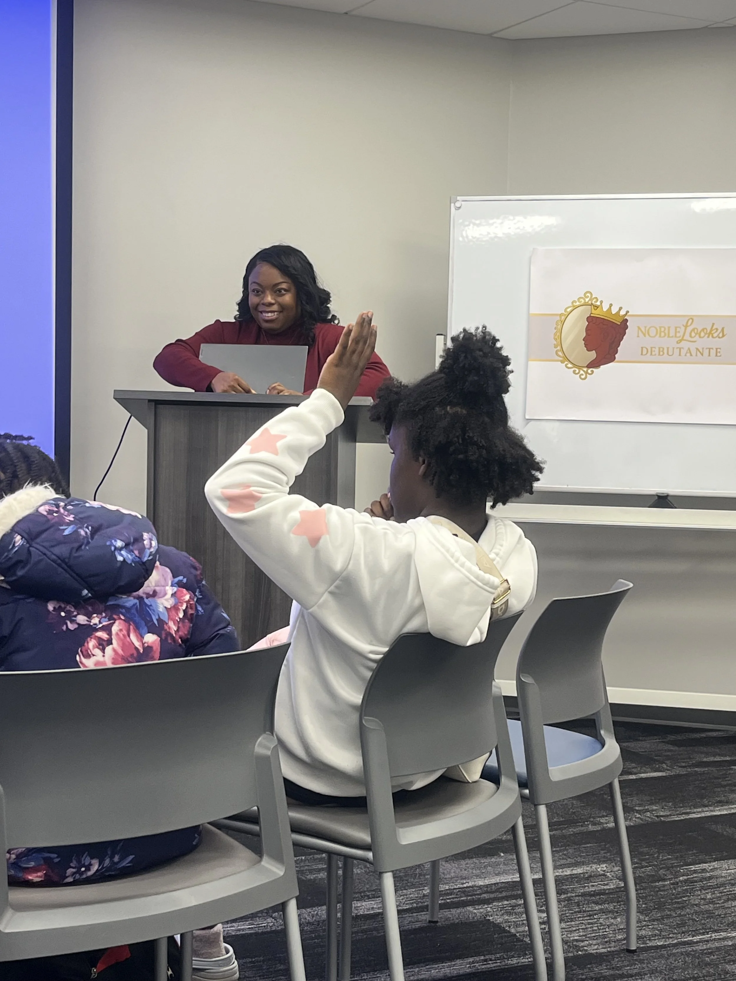 Debutantes are in Career Development Workshop hosted by TaMara LaShae