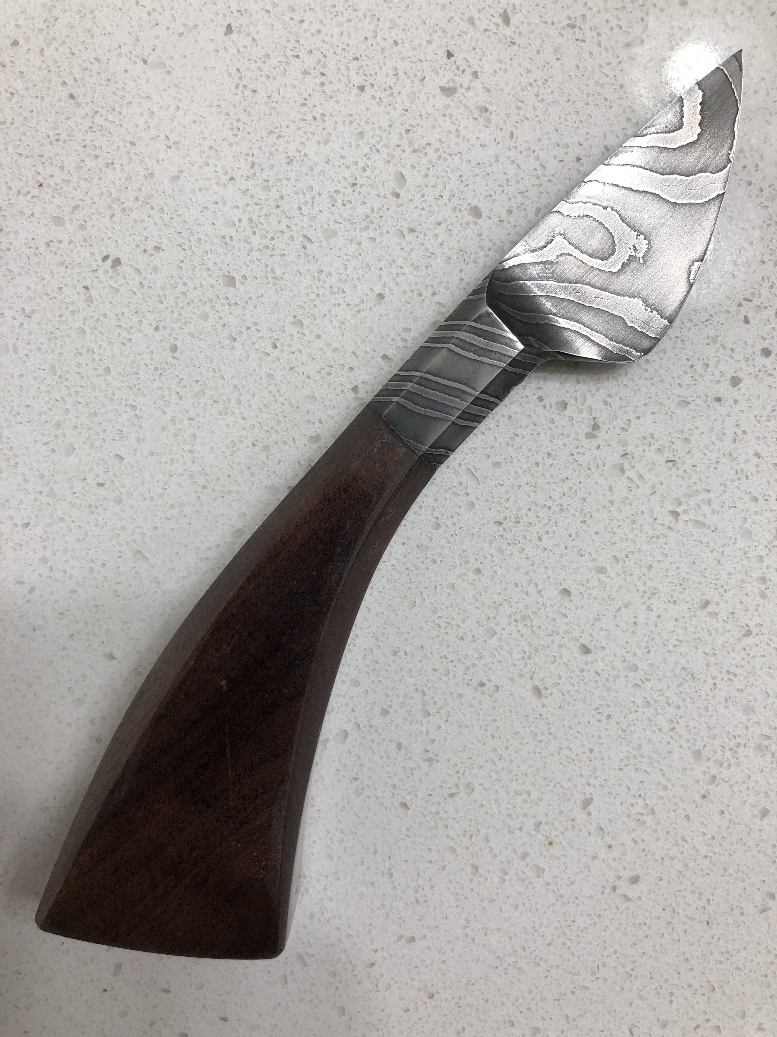First successful Damascus Knife: Twisted Damascus and Walnut handle w/ pommel nut constuction