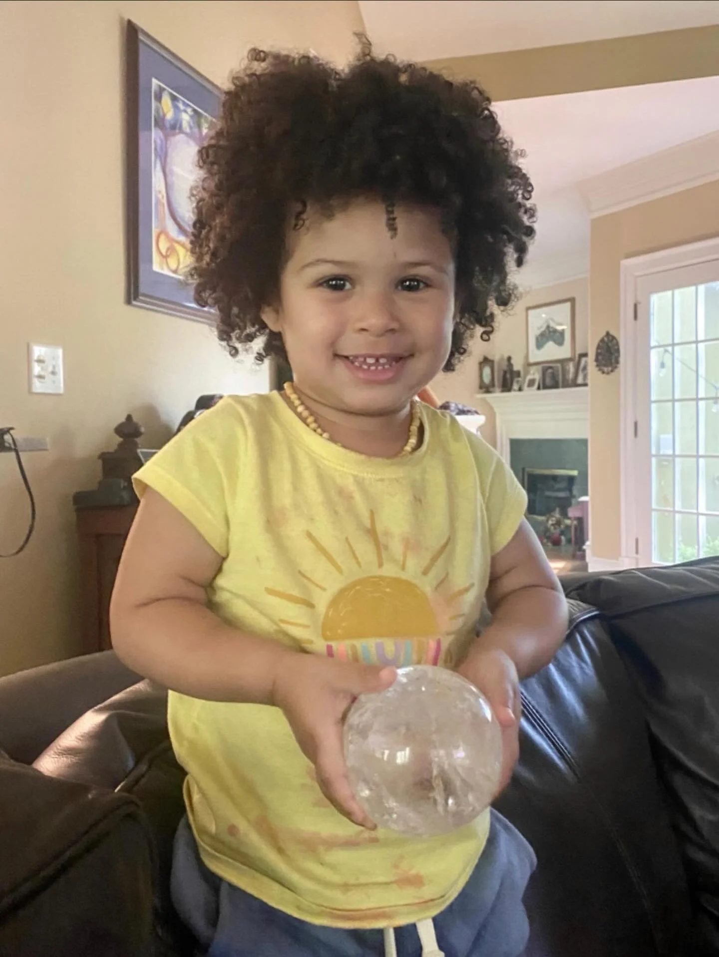 The cutest throwback!! Riley was totally in awe of this clear quartz sphere ✨
The kids love crystalsss!!! 

#smallbusiness #metaphysicalshop #crystalmagic