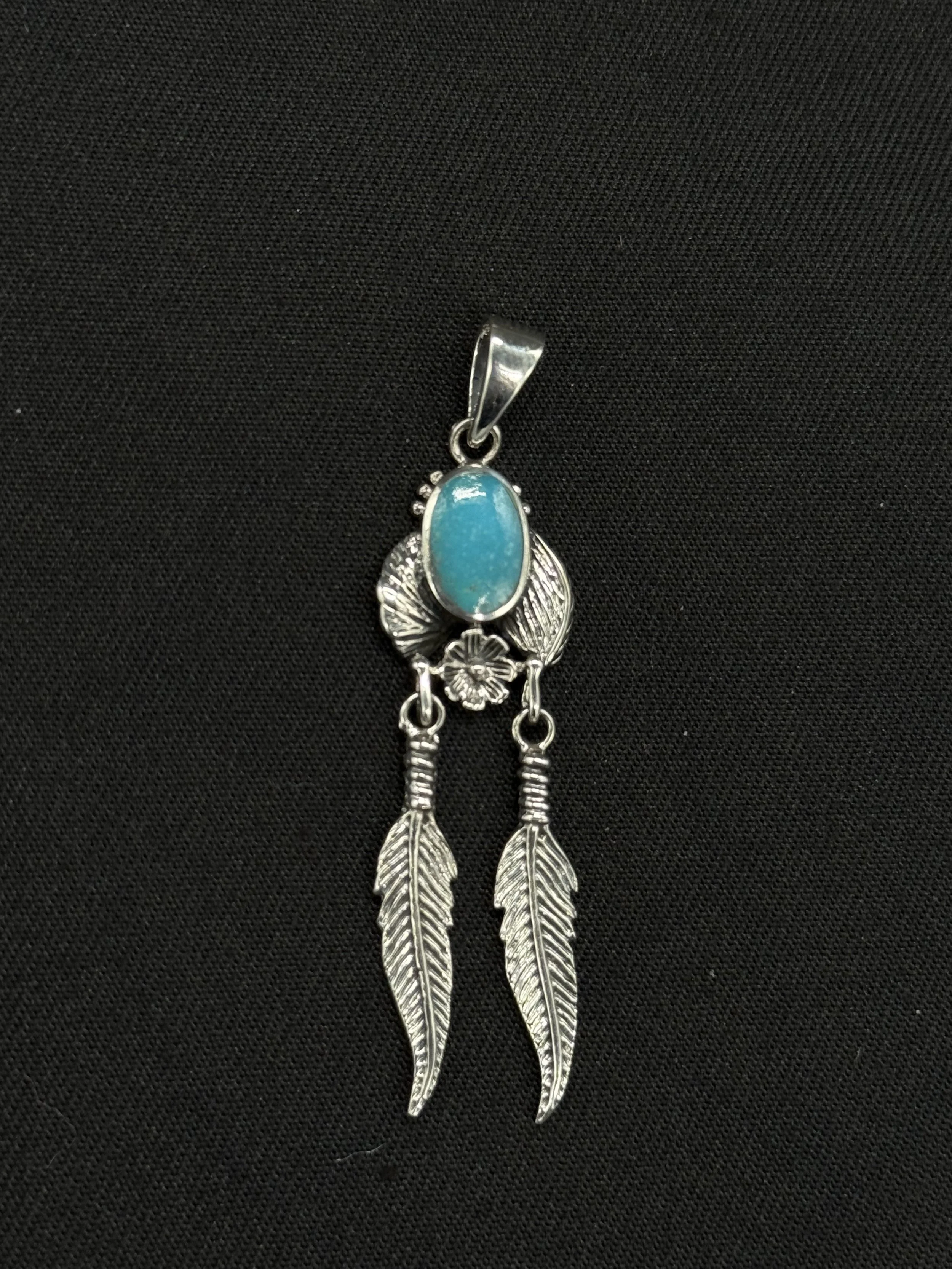 turquoise feather pendant.JPG