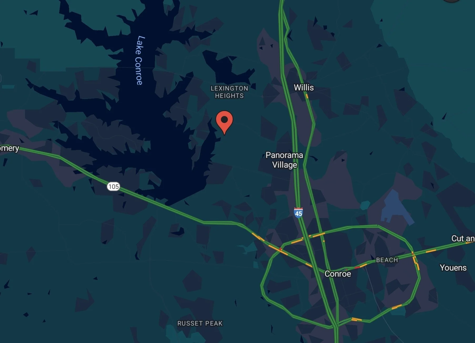 Map showing the area around Lake Conroe, Texas, with roads, highways, and towns such as Montgomery, Willis, and Conroe, along with Lake Conroe in the center.