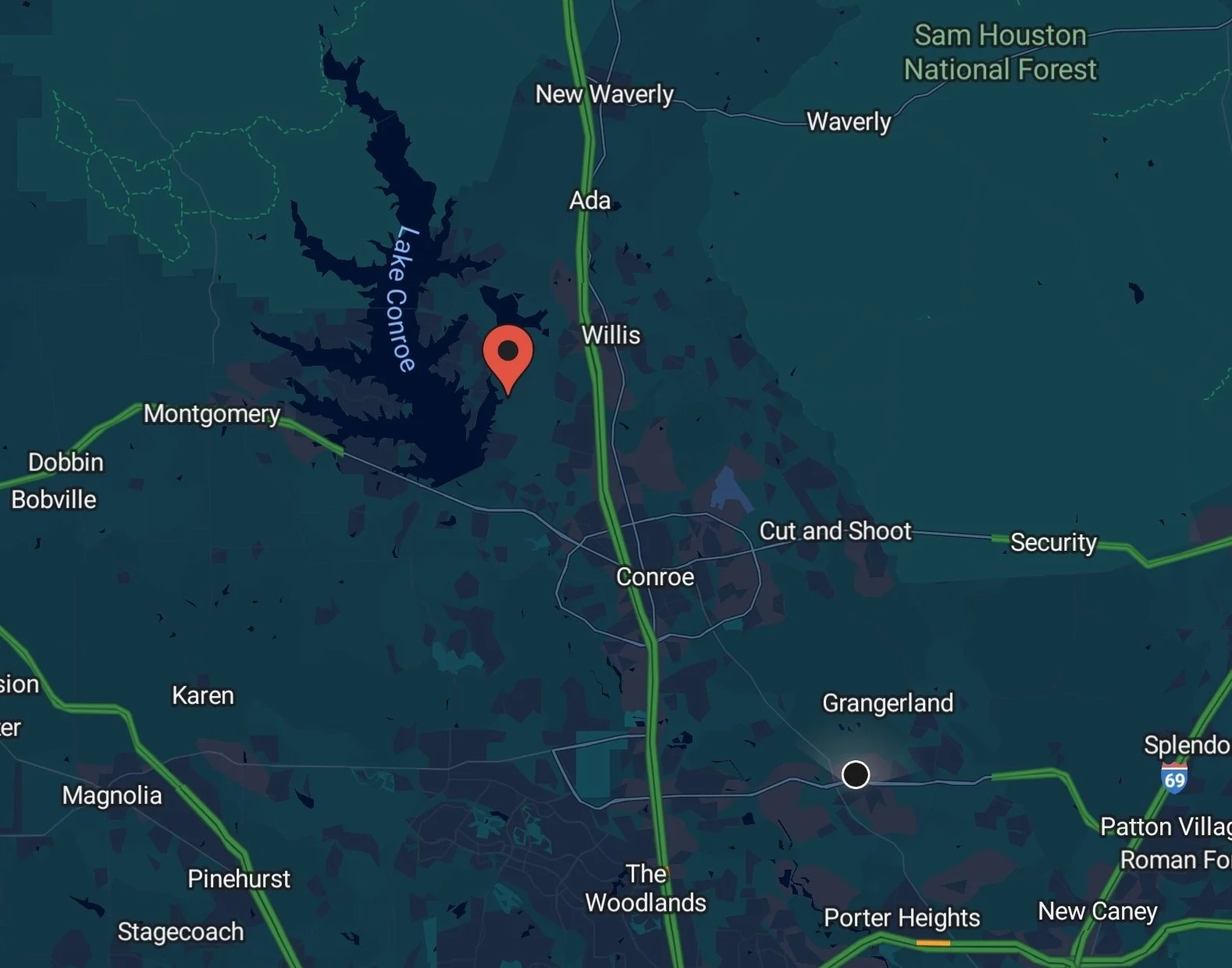 Map showing roads, towns, and landmarks around Lake Conroe, Texas, including Montgomery, Dobbin, Bobville, Conroe, and the Sam Houston National Forest.