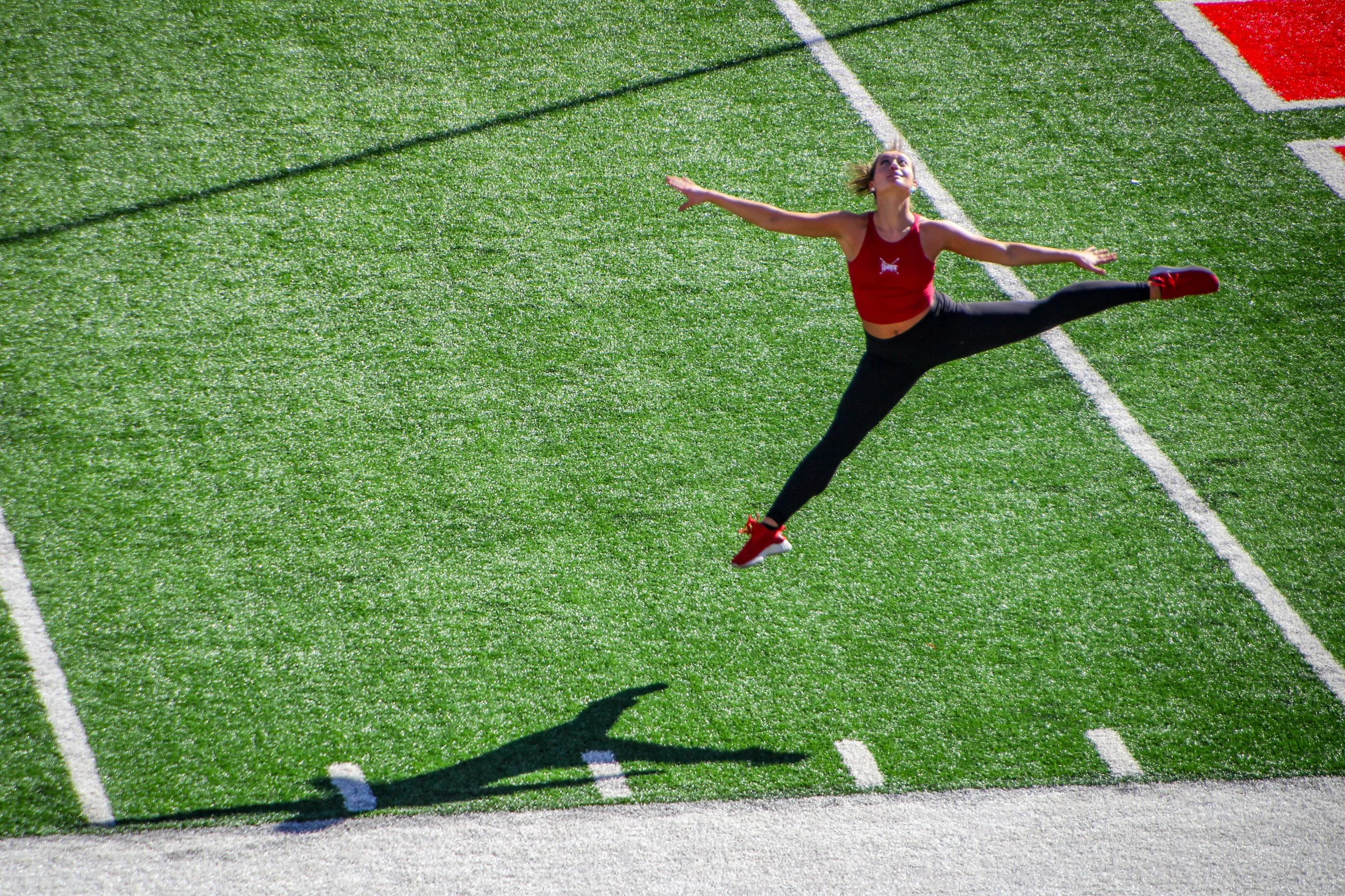 Baton twirler warm-ups before a University of Nebraska football game, Memorial Stadium, Lincoln