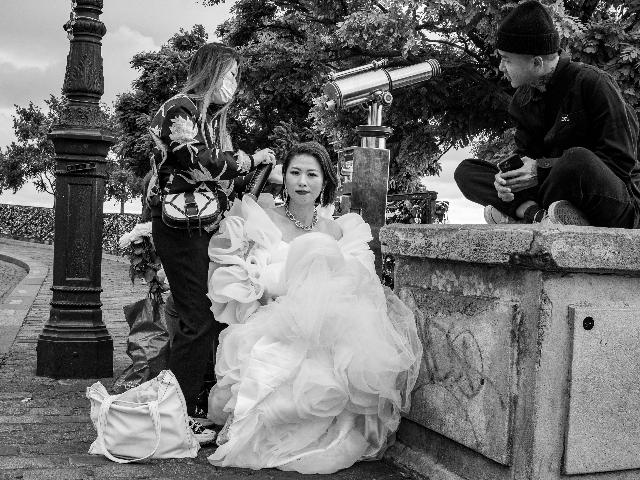 As this woman prepared to get married, I caught her eye, lifted my camera, and lifted my eyebrow to ask permission. She smiled slightly and let me make a few photographs of her.  We never spoke.