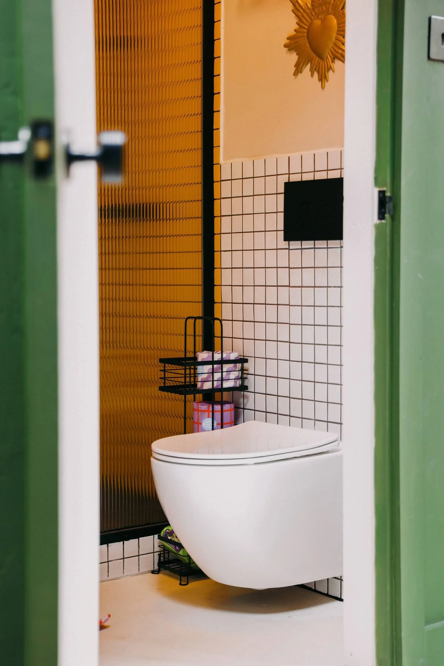 maquette-studio-wc-mustard-tile-ribbed-glass-toilet.jpeg