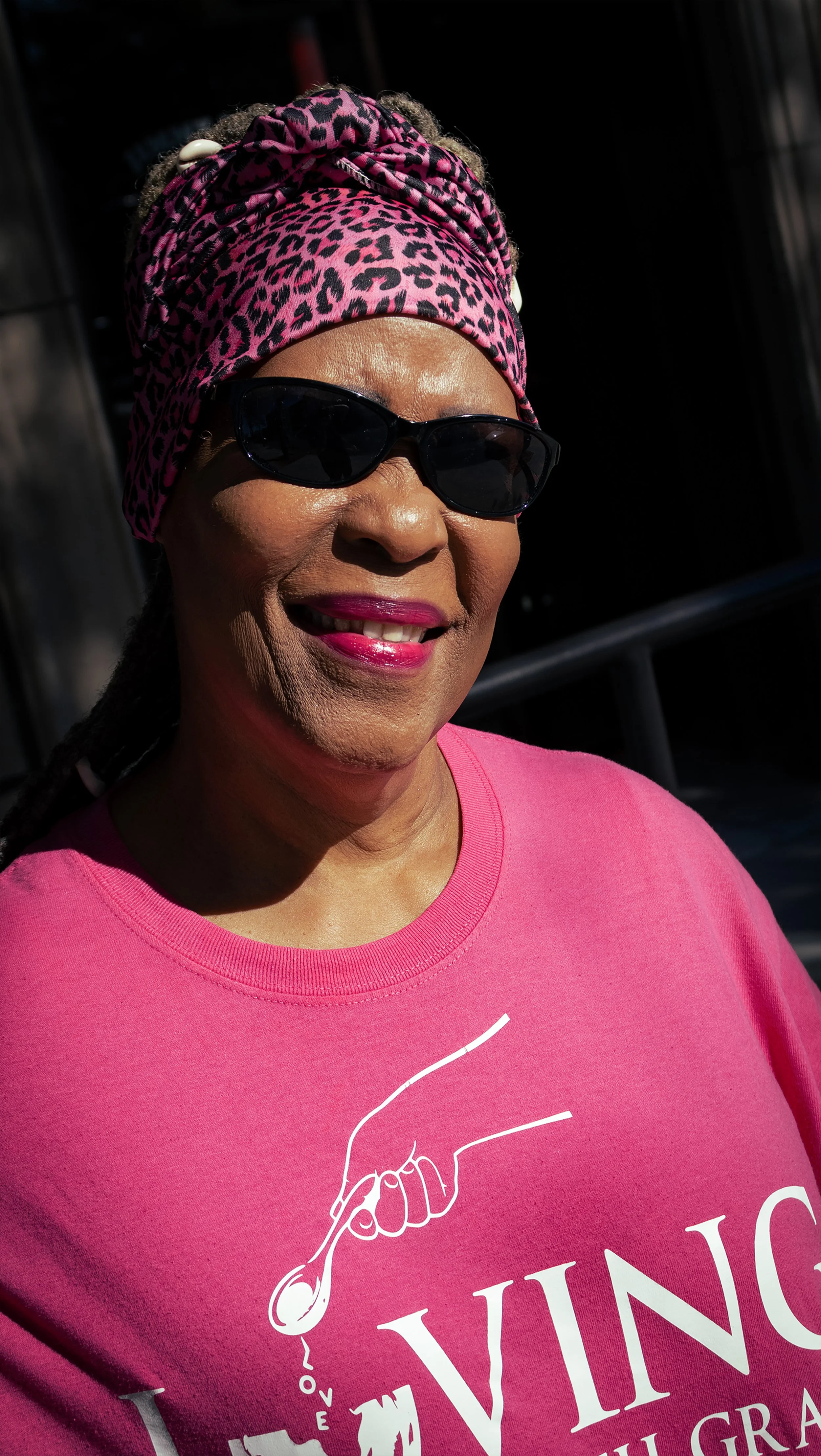 “Gracefully Pink”
Grace was happy and boisterous to get her photograph taken. She made it obvious to me right away, through conversation and her clothing, that her favorite color is pink. She got her favorite pink shirt down in Pittsburgh.