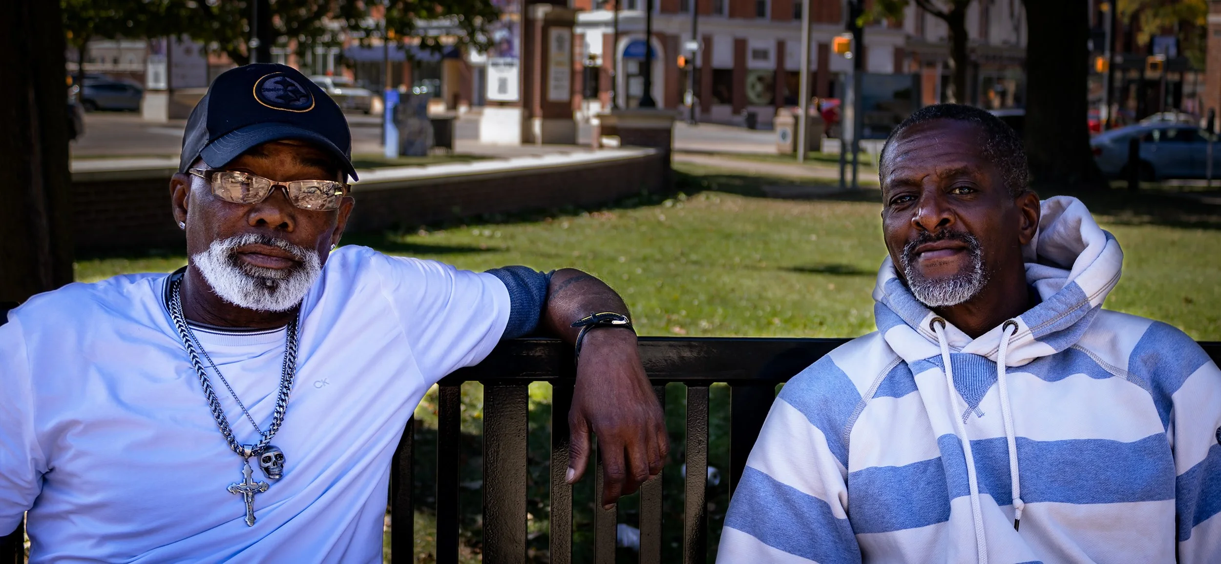 “Bench Brother’s”
These two men were relaxing, drinking some beers on a bench in Perry Square. They were hesitant at first to get their photographs taken but gained some confidence once they realized their looks and style deserved to be photographed.